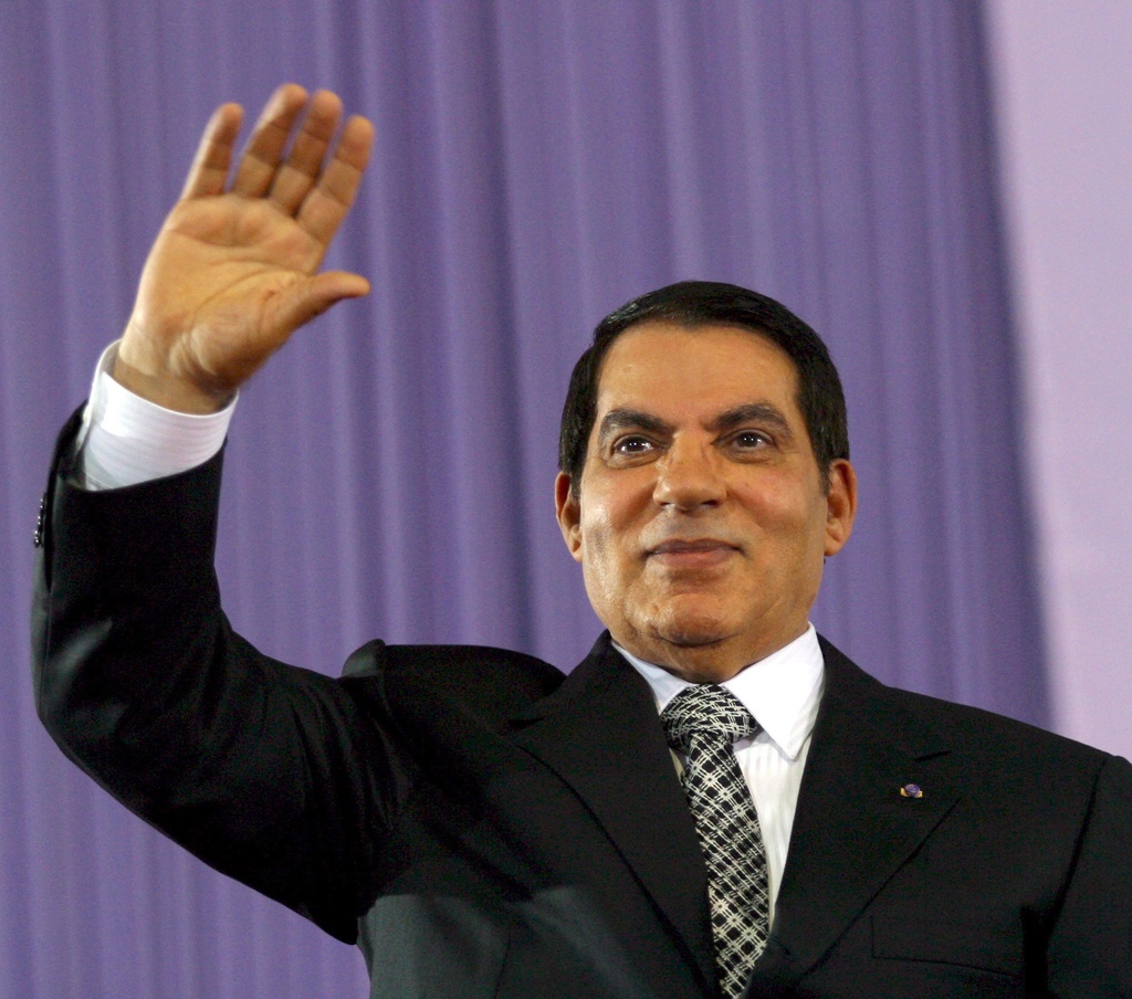 epa03057603 (FILE) A file photo dated 07 November 2007 showing Tunisian President Zine Al-Abidine Ben Ali waving upon his arrival at the Olympic Stadium in Rades, Tunisia. Tunisians will mark the first anniversary of the fall of dictator Zine El Abidine Ben Ali on 14 January 2012 and take stock following a year of mixed blessings for the country that led the Arab world down the road of revolution. On January 14, 2011, Ben Ali and his wife went into exile in Saudi Arabia after a month of protests over his corrupt, repressive 23-year rule that unleashed a wave of uprisings across the region.  EPA/STRINGER *** Local Caption *** 00000401910642