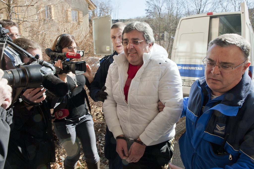 Bulat Chagaev, ancien président de Neuchâtel Xamax, menotté lors de son arrivée au tribunal de Boudry NE le mercredi 29 fevrier 2012, sera détenu jusqu'au 31 mai au moins.