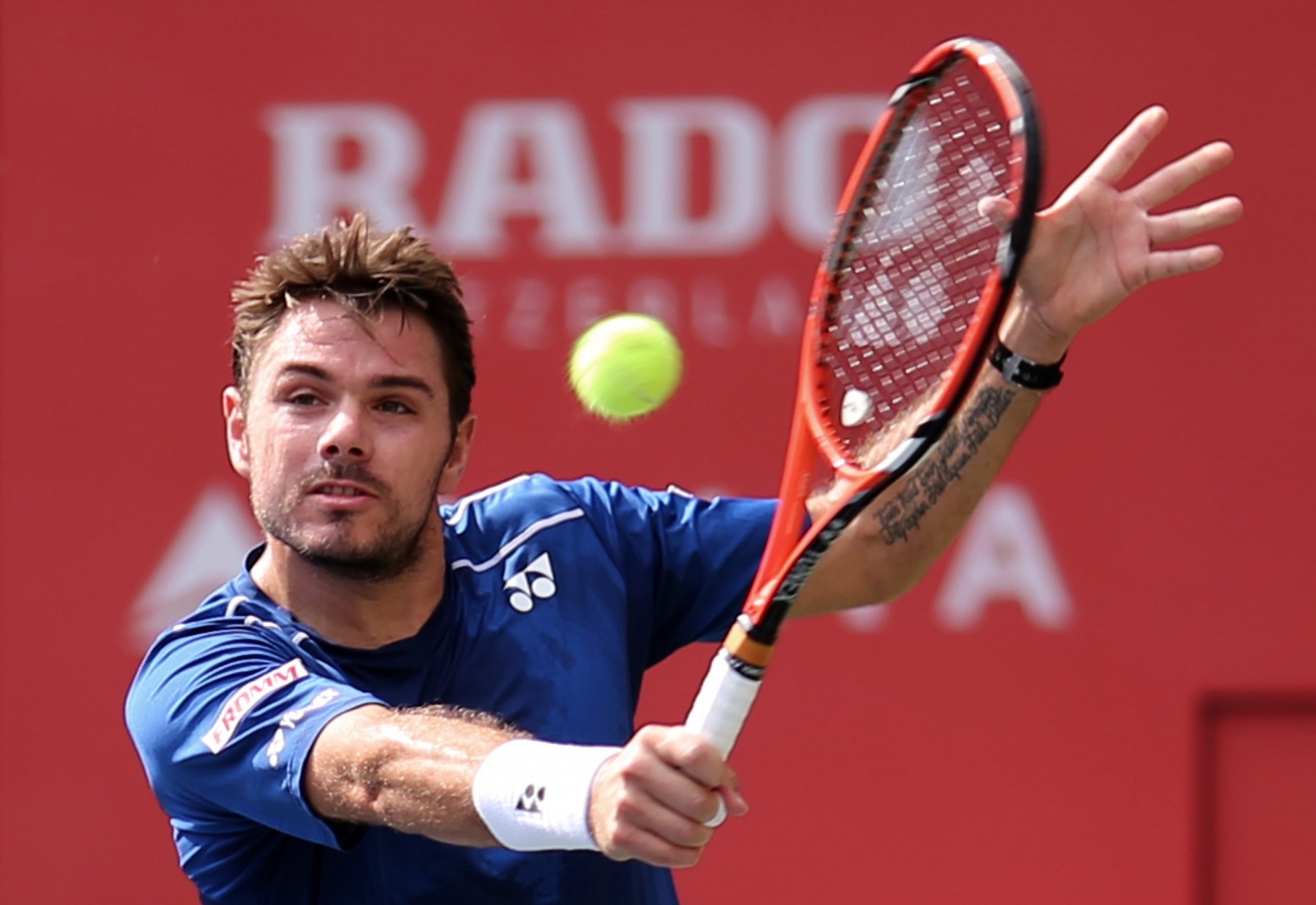 Stan Wawrinka of Switzerland returns a shot against Czech Republic's Radek Stepanek in their men's singles first round match at the Japan Open mens tennis tournament in Tokyo, Tuesday, Oct. 6, 2015. (AP Photo/Eugene Hoshiko) Japan Open Tennis