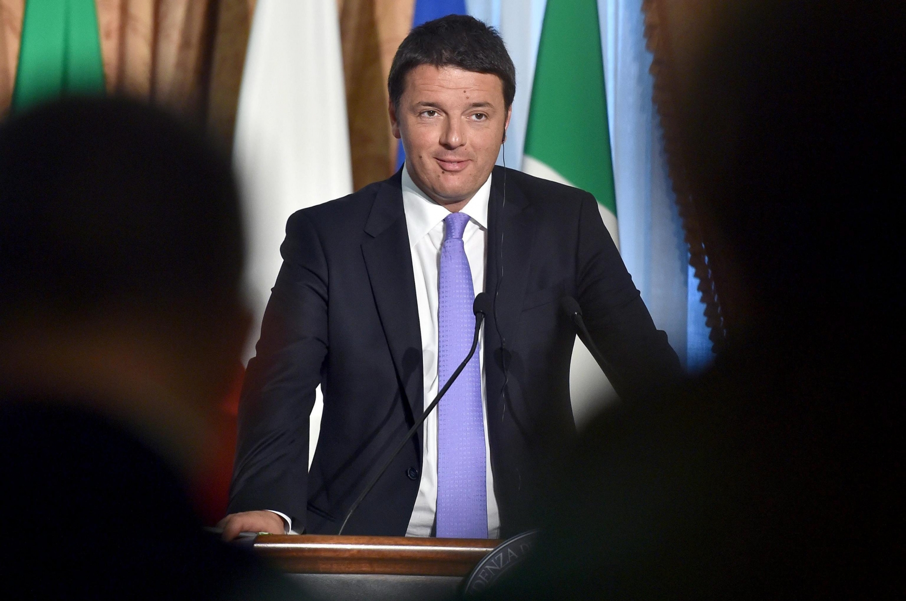 epa04214279 Italian Prime Minister Matteo Renzi reacts during a joint press conference with Polish Prime Minister Donald Tusk (not pictured) at Villa Doria Pamphilj in Rome, Italy, 19 May 2014. Premier Matteo Renzi hit back on 19 May 2014 after Beppe Grillo, the leader of the anti-establishment 5-Star Movement (M5S), used a Mafia jibe to suggest his political career was close to ending as the campaign for Sunday's European elections grew increasingly venomous.  EPA/ETTORE FERRARI ITALY RENZI GRILLO