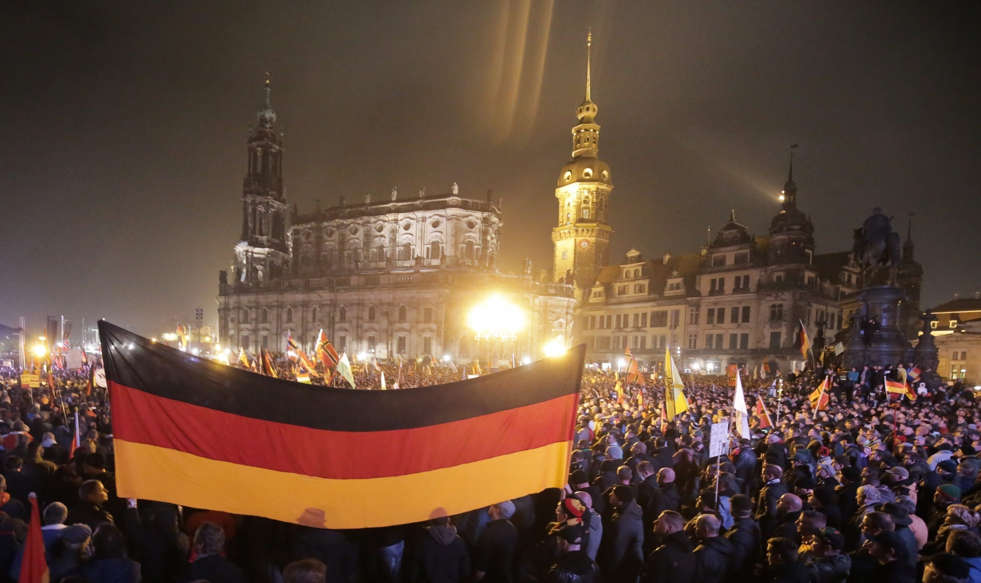 epa04984324 Pegida demonstrators in Dresden, Germany, 19 October 2015. One year ago, Pegida (Patriotic Europeans against the Islamification of the West), took to the streets for the first time.  EPA/MICHAEL KAPPELER GERMANY PEGIDA