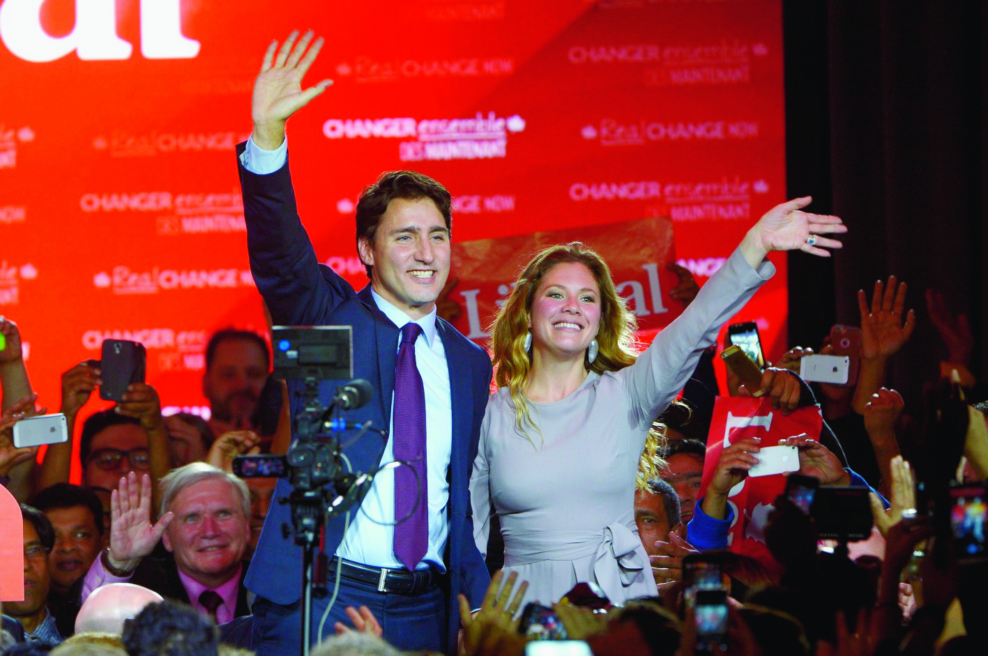 Liberal leader Justin Trudeau waves with his wife Sophie Gregoire at the Liberal party headquarters in Montreal, Tuesday, Oct. 20, 2015. Trudeau, the son of late Prime Minister Pierre Trudeau, became Canadas new prime minister after beating Conservative Stephen Harper. (Paul Chiasson/The Canadian Press via AP) MANDATORY CREDIT Canada Election