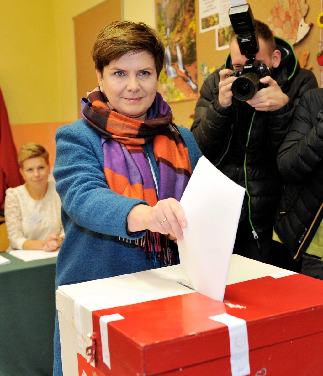 Beata Szydlo, candidate for prime minister of the conservative opposition Law and Justice party in Poland's general elections casts her ballot in Przecieszyn, in Poland, on Sunday, Oct. 25, 2015. Mixing Catholic values with welfare policy, the Law and Justice was leading the polls, ahead of the ruling pro-business Civic Platform party, just days before the vote. (AP Photo) POLAND OUT Poland Elections