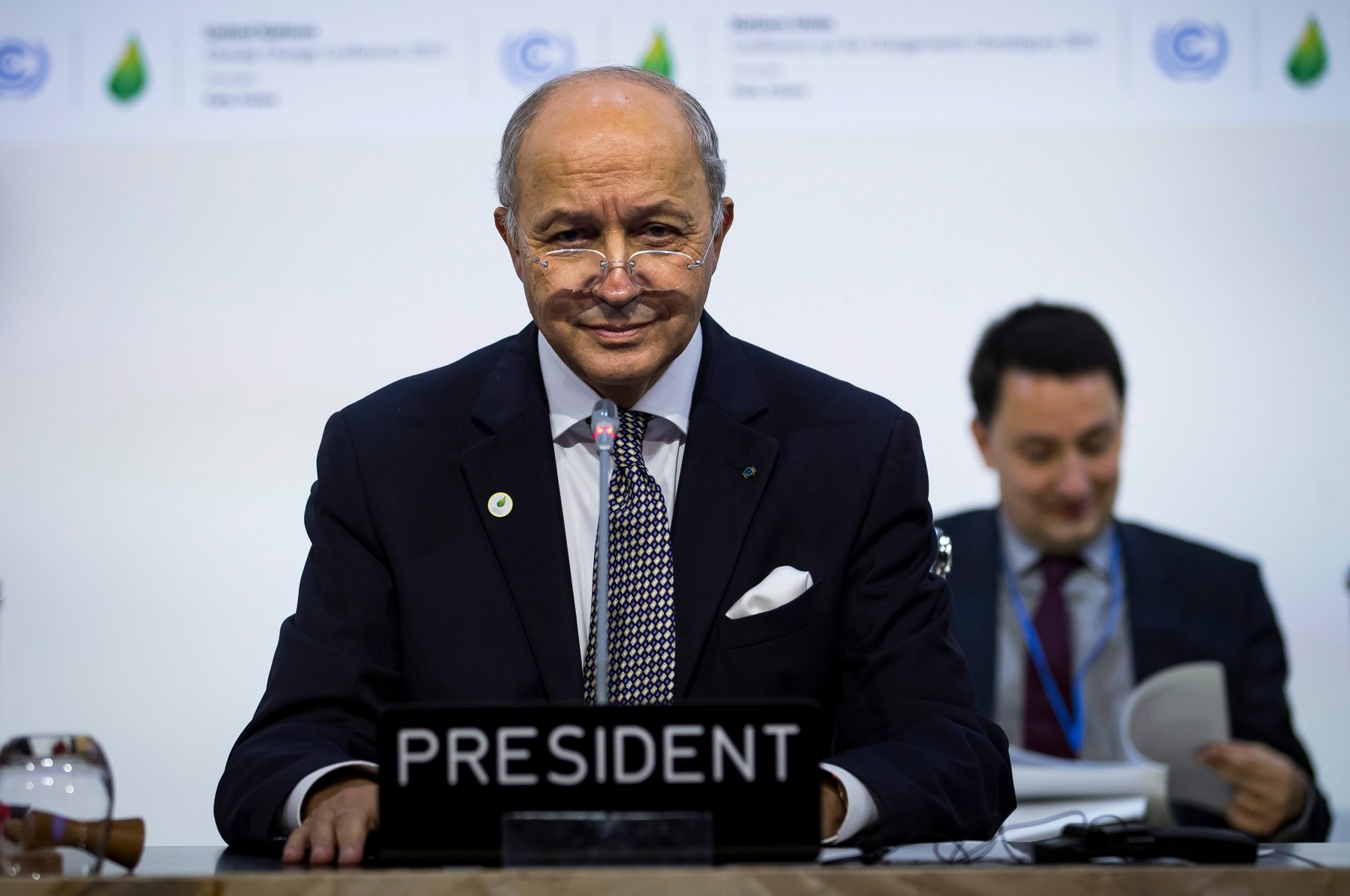 epa05061659 French Foreign affairs minister and acting president of the COP21, Laurent Fabius hosts the 'Committee of Paris' plenary work session at 'the COP21 Climate Conference in Le Bourget, north of Paris, France, 09 December 2015. The 21st Conference of the Parties (COP21) is held in Paris from 30 November to 11 December aimed at reaching an international agreement to limit greenhouse gas emissions and curtail climate change.  EPA/IAN LANGSDON FRANCE COP21