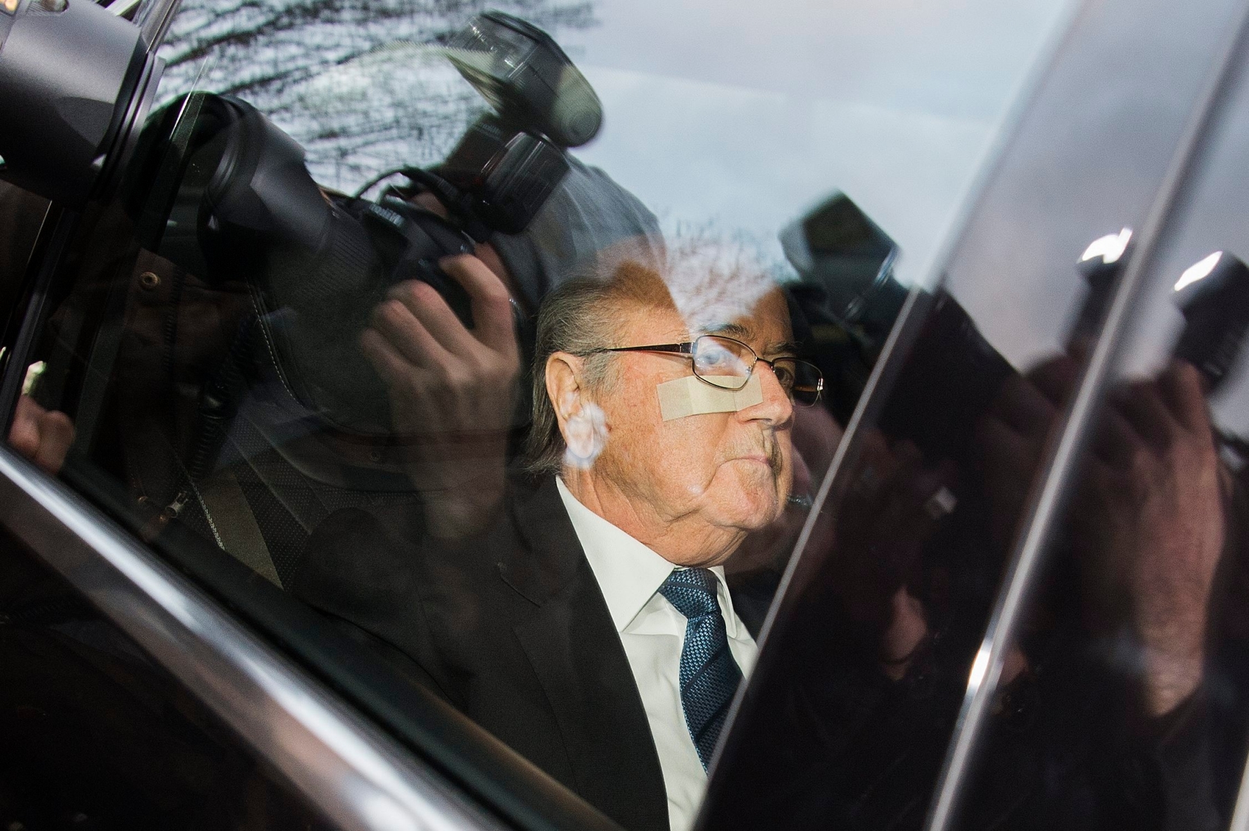 FIFA President Joseph S. Blatter arrives in a car at the FIFA Headquarters "Home of FIFA" in Zurich, Switzerland, Thursday, 17 December 2015. While FIFA President Joseph S. Blatter will appear in person on Thursday before the panel of four judges of the FIFA ethics court, UEFA President Michel Platini plans to boycott his hearing on Friday 18 December. Blatter and Platini were banned for 90 days on 8 October. (KEYSTONE/Walter Bieri) SWITZERLAND SOCCER FIFA JOSEPH S. BLATTER