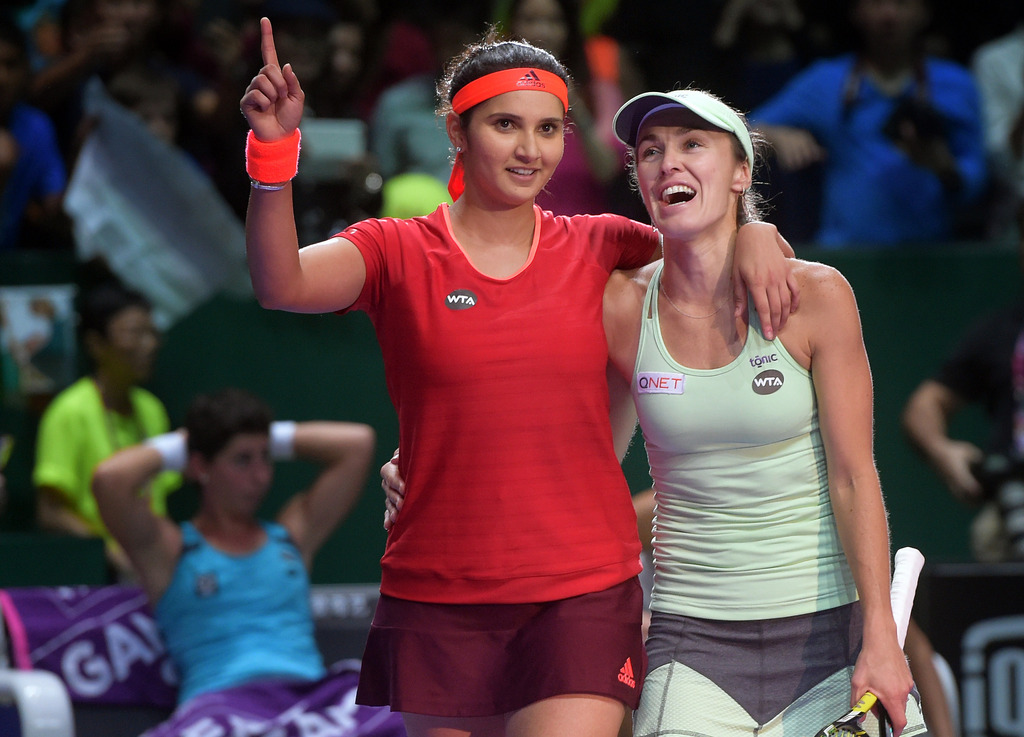 Martina Hingis et Sania Mirza, ici au tournoi WTA de Singapour en novembre dernier, se sont hissées en demi-finale à Sydney.