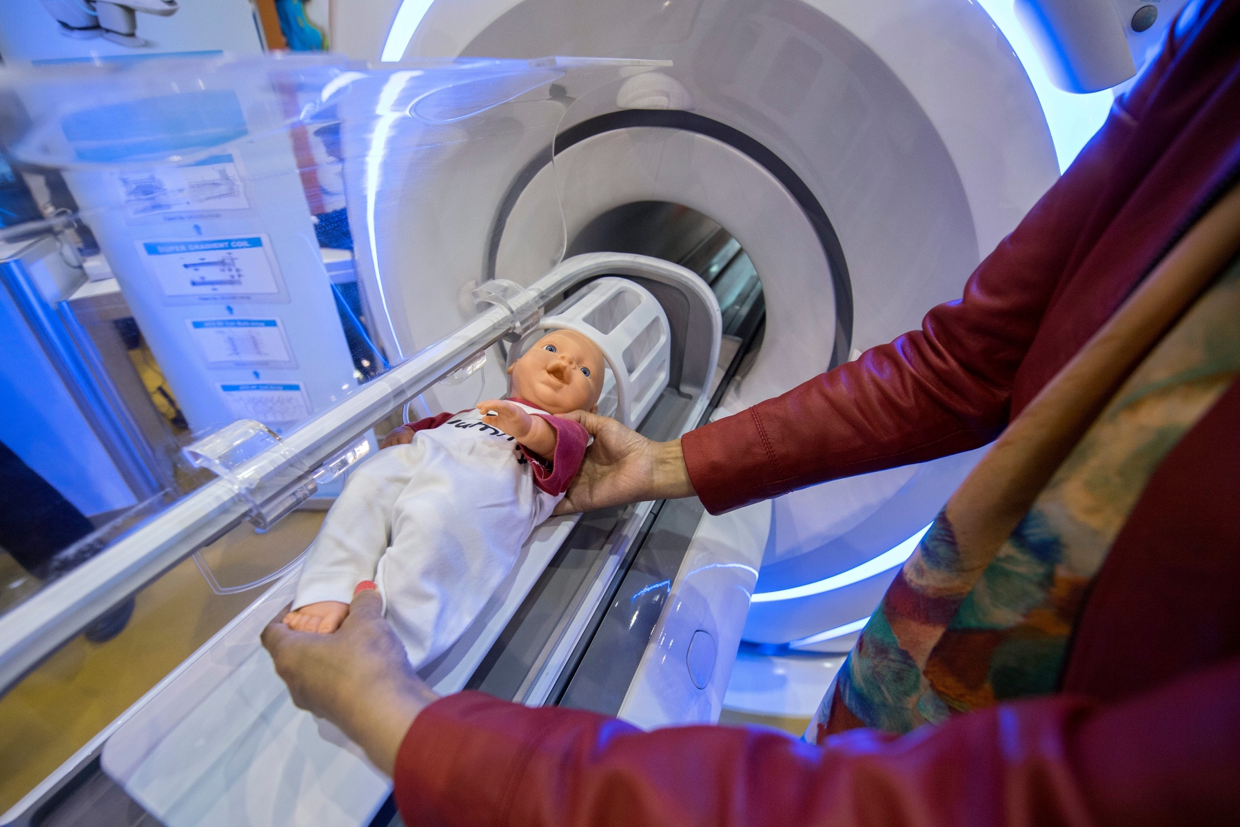A person of China presents an invention called Neona, at the 44th International Exhibition of Inventions, New Techniques and Products, in Geneva, Switzerland, Wednesday, April 13, 2016. Neona is the world-first 1.5T dedicated neonatal MRI system that can be installed directly in neonatal intensive care units. 700 exhibitors from around the world are presenting around 1000 products hoping to catch the eye at the 44th International Exhibition of Inventions, which runs from 13 to 17 April 2016. (KEYSTONE/Martial Trezzini) SWITZERLAND EXHIBITION INVENTIONS GENEVA 2016