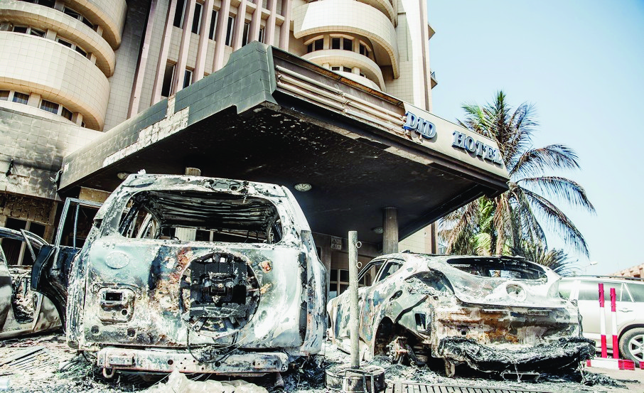 epa05109130 A general view of damaged vehicles outside of the Splendid Hotel in Ouagadougou, Burkina Faso 18 January 2016. According to media reports at least 28 people from 18 nationalities were killed after Islamist militants attacked The Splendid Hotel frequented by many westeners in Burkina Faso the evening of 15 January 2016. A joint operation by French and Burkina Faso forces freed many hostages on 16 January 2016. Al-Qaeda in the Islamic Maghreb (AQIM) claimed responsibility.  EPA/WOUTER ELSEN BURKINA FASO SPLENDID HOTEL ATTACK AFTERMATH