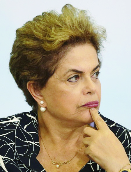 epa05292453 Brazilian President Dilma Rousseff attends a ceremony to launch a new phase of the state-funded housing program, at the Planalto Presidential Palace in Brasilia, Brazil, 06 May 2016. Brazil's lower house of Congress voted on 17 April in favor of impeaching Rousseff for allegedly manipulating budget figures to minimize the deficit. Rousseff denies the allegations, insisting the impeachment process is a coup against her.  EPA/Fernando Bizerra Jr. BRAZIL ROUSSEFF