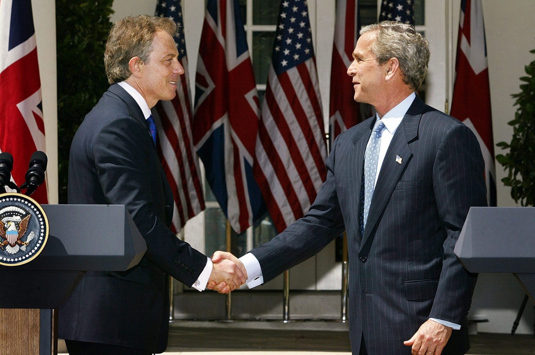 epa05410201 (FILE) A file photo dated 16 April 2004 showing then US President George W. Bush (R) shaking hands with then British Prime Minister Tony Blair after the two leaders answered questions from the news media during a joint press conference in the Rose Garden of the White House, Washington, USA. The report on whether it was right and neccessary to invade Iraq by Sir John Chilcot concluded 06 July 2016 the invasion and subsequent war against Iraq was 'not the last resort'. Chilcot also said US and British policy on Iraq based on 'flawed intelligence and assessments'.  EPA/SHAWN THEW *** Local Caption *** 00173267 FILE USA BRITAIN IRAQ WAR INQUIRY