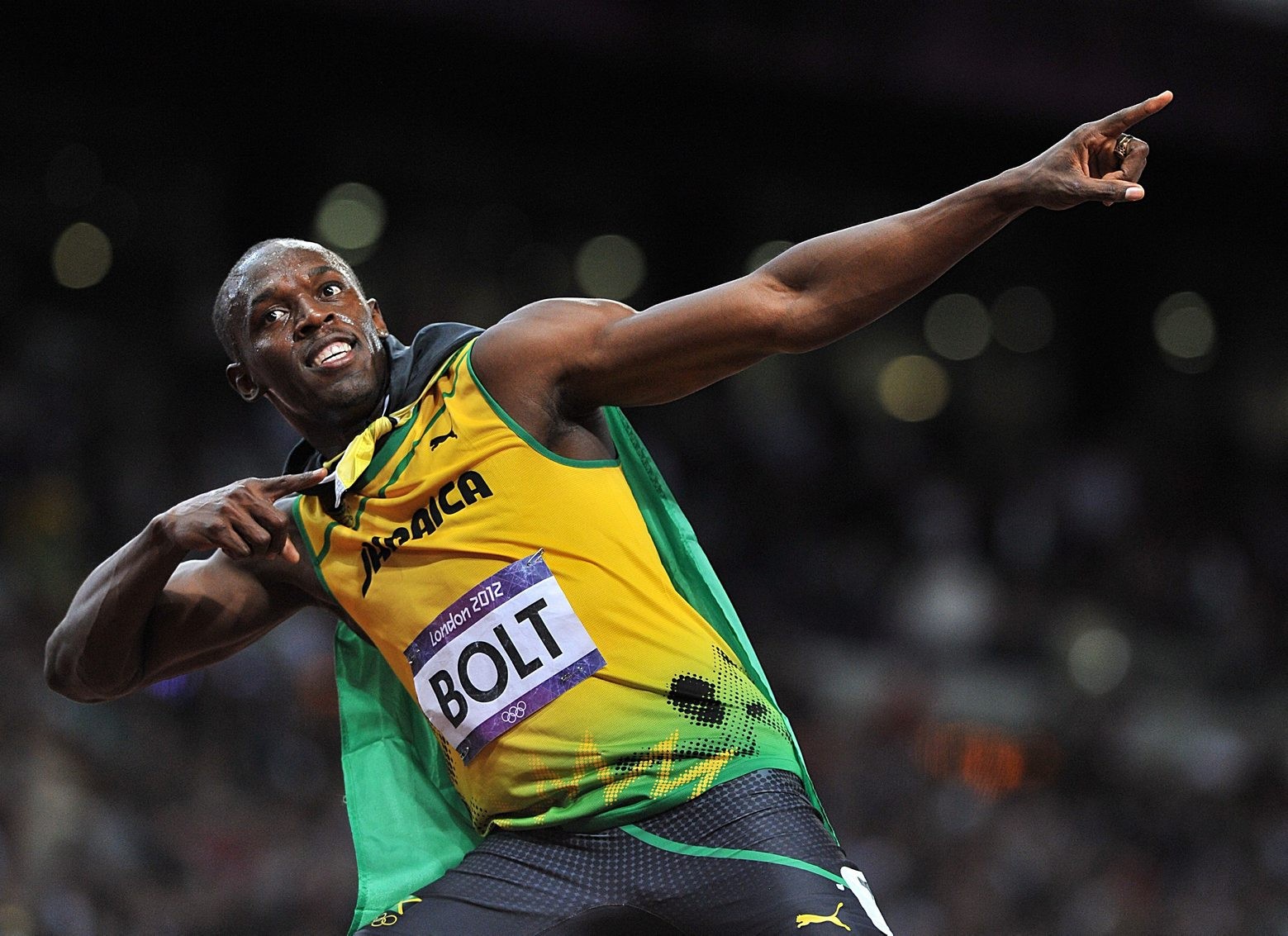 File photo dated 05-08-2012 of Jamaica's Usain Bolt celebrates winning the Men's 100m final at the Olympic Stadium, London. (KEYSTONE/PRESS ASSOCIATION IMAGES/Martin Rickett) 28055944