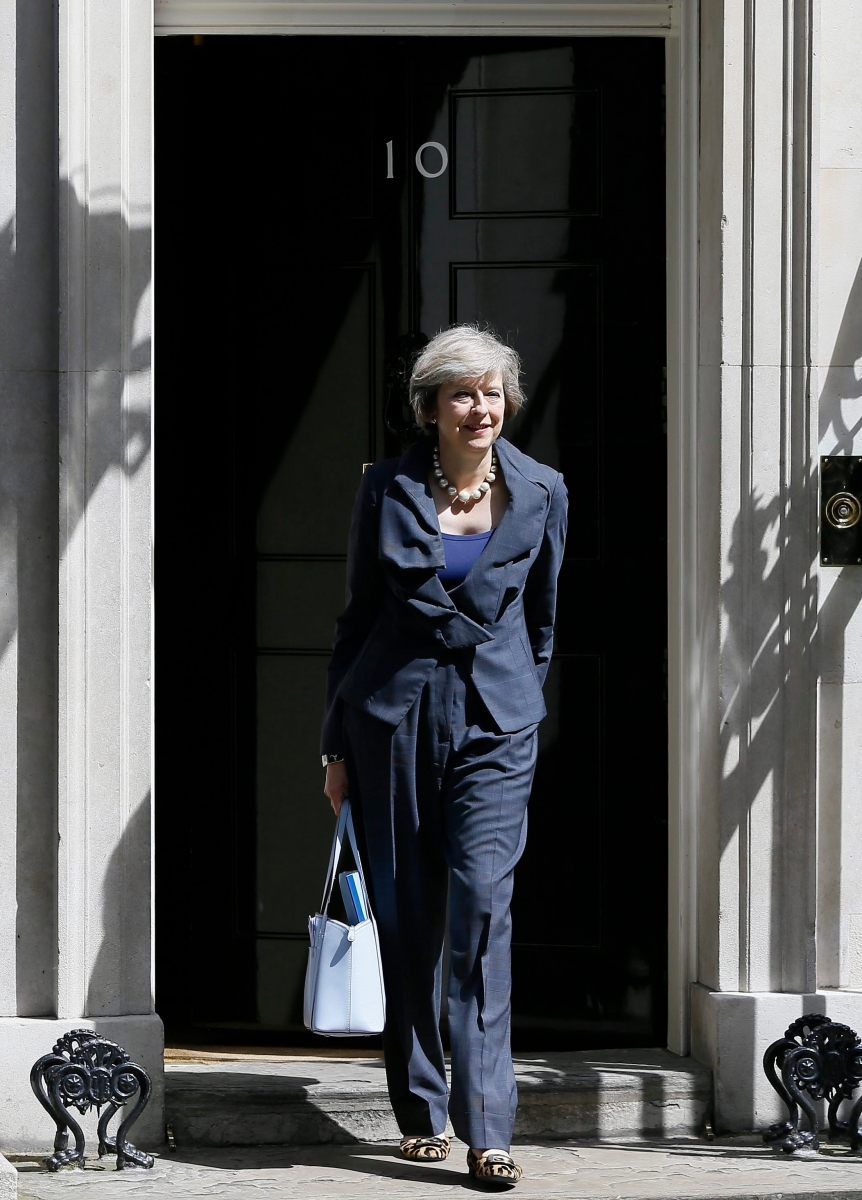 Britain's Home Secretary Theresa May leaves after attending a cabinet meeting at 10 Downing Street, in London, Tuesday, July 12, 2016. Theresa May will become Britain's new Prime Minister on Wednesday. (AP Photo/Kirsty Wigglesworth) Britain Politics