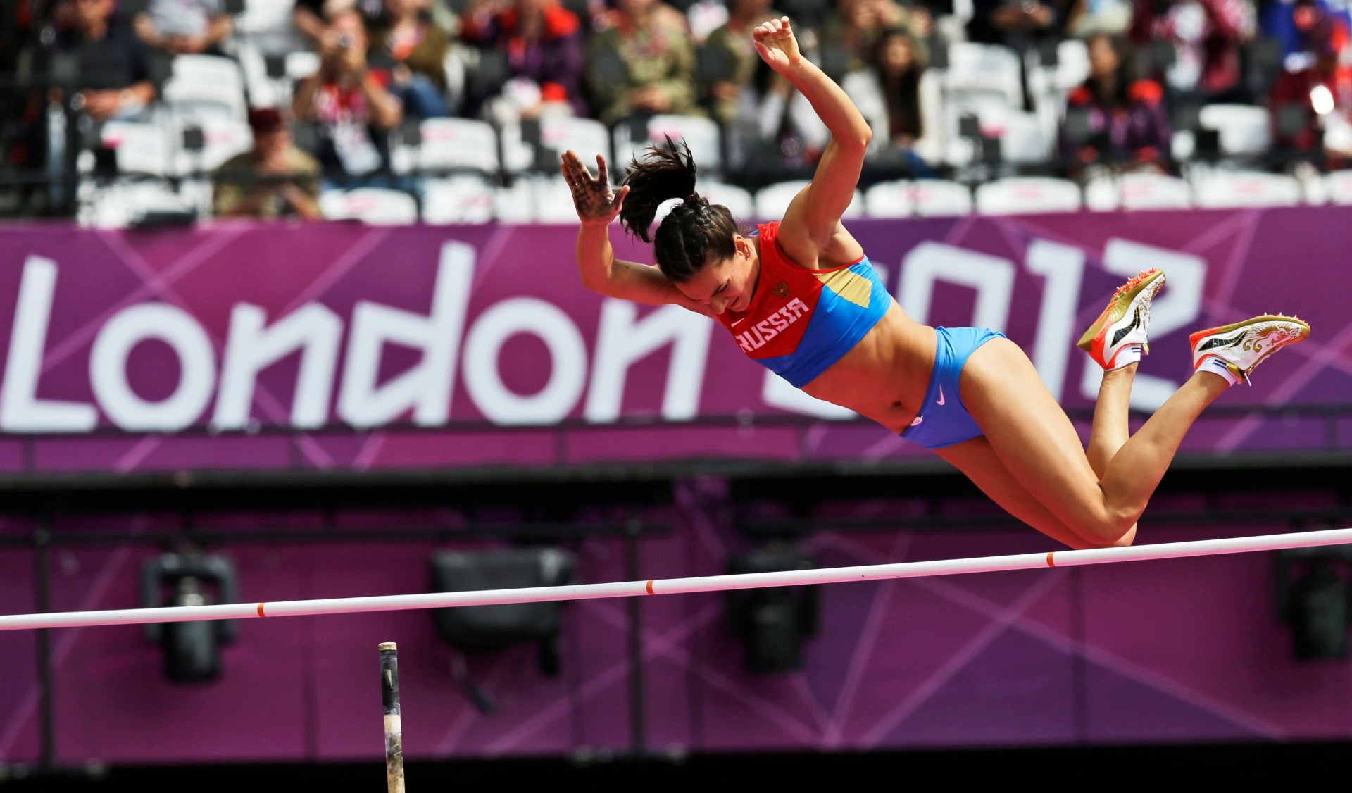 FILE - In this Aug. 4, 2012 file picture Russia's Yelena Isinbayeva competes in a women's pole vault qualification round during the athletics in the Olympic Stadium at the 2012 Summer Olympics, London.  The Court of Arbitration for Sport  was scheduled to issue a verdict Thursday  July 21, 2016 in the case of 68 Russian track and field athletes seeking to overturn the ban imposed by the IAAF following allegations of state-sponsored doping and cover-ups. Russia lost the appeal against an Olympic ban on its track and field athletes Thursday   (AP Photo/David J. Phillip,file) OLY Russia Doping