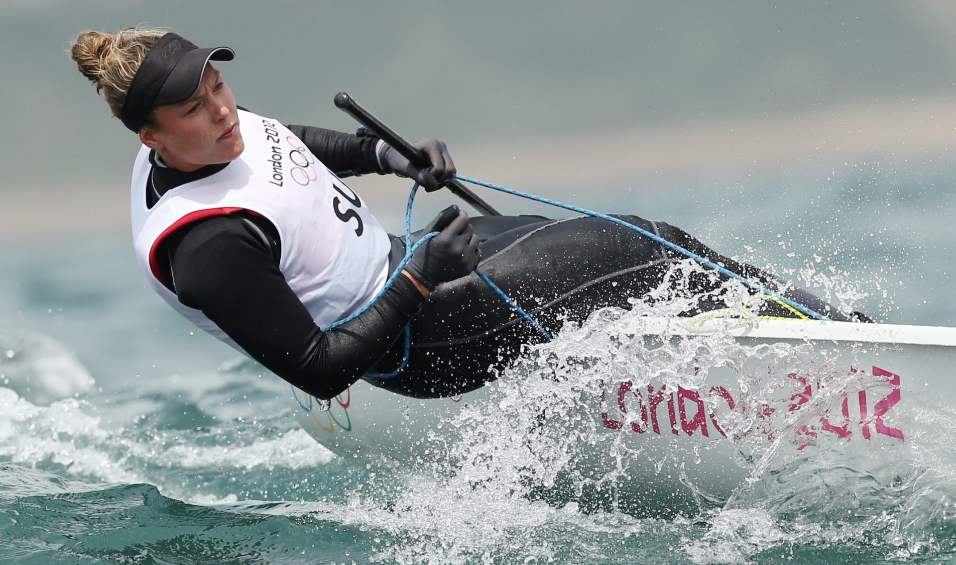 ALS VORSCHAU ZU DEN OLYMPISCHEN SOMMERSPIELEN IN RIO VOM 5. BIS 21. AUGUST 2016 STELLEN WIR IHNEN FOLGENDES BILDMATERIAL ZU DEN SCHWEIZER TEILNEHMERN UND TEILNEHMERINNEN  ZUR VERFUEGUNG - Nathalie Brugger of Switzerland competes during the Womens Laser Radial class at the London 2012 Olympic Games Sailing competition in Weymouth, Britain, 04 August 2012.  EPA/OLIVIER HOSLET BRASILIEN OLYMPIA RIO 2016 TEAM SCHWEIZ SELEKTIONIERTE