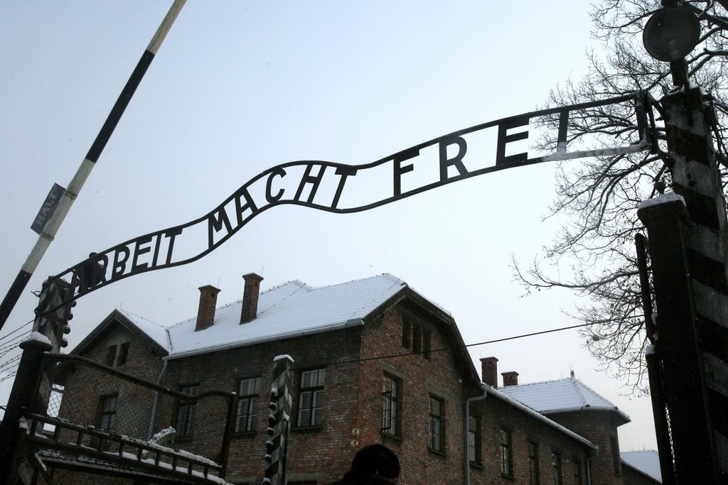 epa03079624 (FILE) A file photograph dated 18 December 2009 shows the replacement ''Arbeit Macht Frei'' ('Work Makes Free') sign at the entrance the former Auschwitz-Birkenau Nazi death camp in Oswiecim (Auschwitz). Germany on 20 January 2012 marked the 70th anniversary of the Wannsee Conference, when high-ranking Nazi officials met to plan the genocide of European Jews, the process that became infamous as the Nazi???s "Final Solution". Media reports citing a recently carried out survey by the Forsa research institute shows more than than 20 per cent of young Germans did not know the name Auschwitz or what happened there. The reports say the survey revealed  that 21 per cent of people aged between 18 and 30 who were asked about the most notorious Nazi extermination camp had not heard of it. The International Holocaust Remembrance Day on 27 January marks the liberation of the biggest death camp, Auschwitz, by Soviet forces on 27 January 1945.  EPA/JACEK BEDNARCZY POLAND OUT *** Local Caption *** 00000401972130