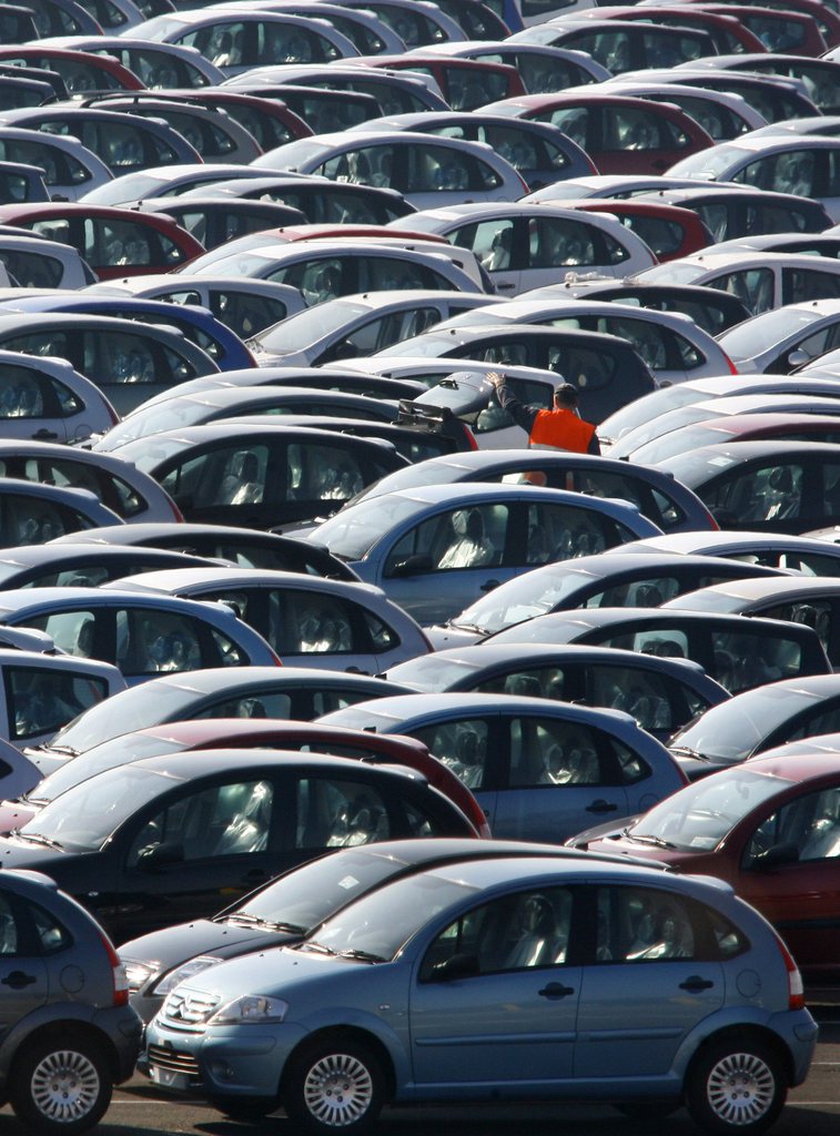 FILE - In this Feb.19, 2008 file photo Citroen cars park outside the Aulnay sous Bois factory, near Paris, France.  French car maker PSA Peugeot Citroen unveils Thursday July, 12, 2012,  cost-cutting measures that includes several thousand job-cuts. The maker of the popular Peugeot 207 hatchback is trying to save euro 1 billion ($1.2 billion) this year as it struggles to compete in Europe's fiercely competitive car market particularly amid a slump in sales in the recession-hit south of Europe. (AP Photo/Jacques Brinon, File)