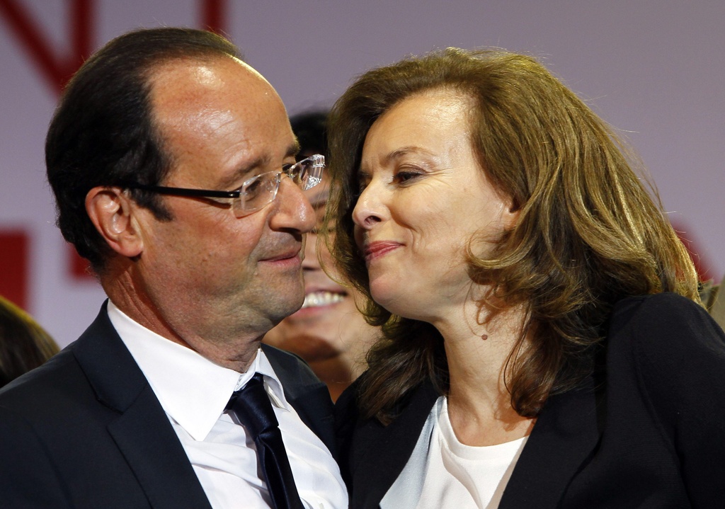 French president-elect Francois Hollande, left, embraces his companion Valerie Trierweiler after greeting crowds gathered to celebrate his election victory in Bastille Square in Paris, France, Sunday, May 6, 2012. France handed the presidency Sunday to leftist Hollande, a champion of government stimulus programs who says the state should protect the downtrodden - a victory that could deal a death blow to the drive for austerity that has been the hallmark of Europe in recent years. (AP Photo/Francois Mori)