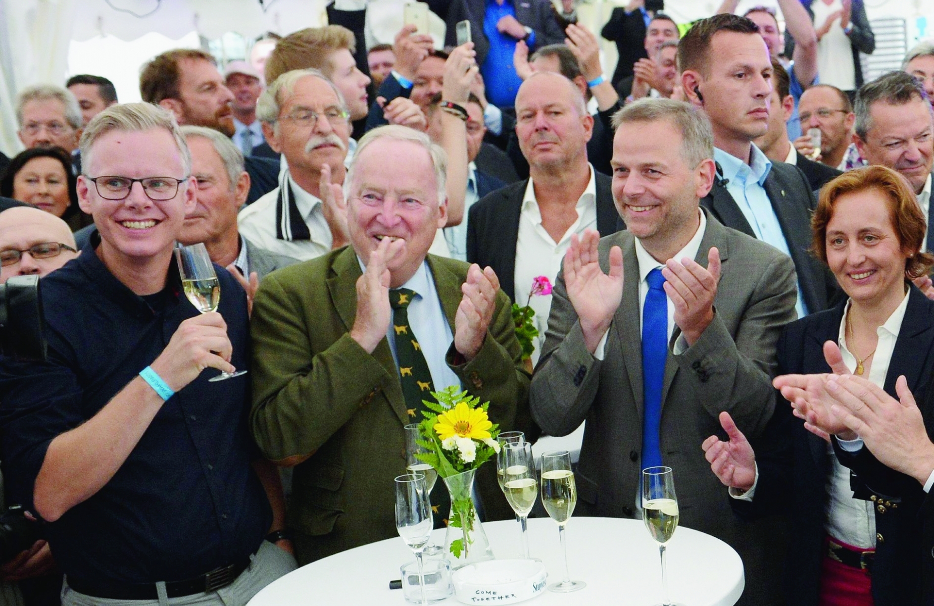 epa05524197 Leif-Erik Holm (2-R), main candidate of the 'Alternative for Germany', or AfD party, for the state parliament election in Mecklenburg-Western Pomerania, and the two deputy federal chairmen Alexander Gauland (2-L) and Beatrix von Storch (R) celebrate after the announcement of the first projection of the state parliament election in Mecklenburg-Western Pomerania, in Schwerin, Germany, 04 September 2016. First exit polls indicate that the AfD became the second strongest party in the north-eastern German state. AfD came second defeating the Christian Democratic Union (CDU) of German Chancellor Angela Merkel, but well behind the ruling Social Democratic Party (SPD).  EPA/DANIEL BOCKWOLDT GERMANY REGINAL ELECTIONS