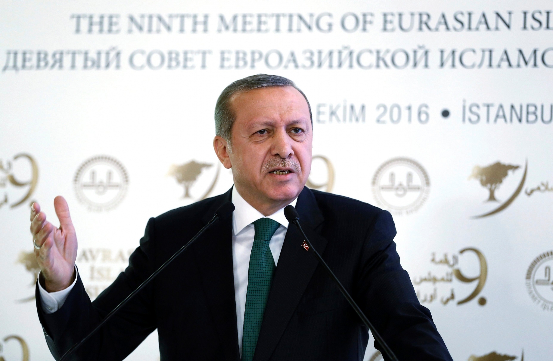 Turkish President Recep Tayyip Erdogan speaks during a meeting on Islam in Eurasia in Istanbul, Tuesday, Oct. 11, 2016. Erdogan says his country is determined to take part in a possible operation to recapture the Iraqi city of Mosul despite objections from Iraq, adding to tensions between the two neighbors. Erdogan on Tuesday also said Turkish troops would not withdraw from a base in northern Iraq near Mosul, where they are training anti-IS fighters Iraqi, saying the Turkish army would not take orders from Baghdad.(Kayhan Ozer, Presidential Press Service, Pool photo via AP) Turkey Iraq