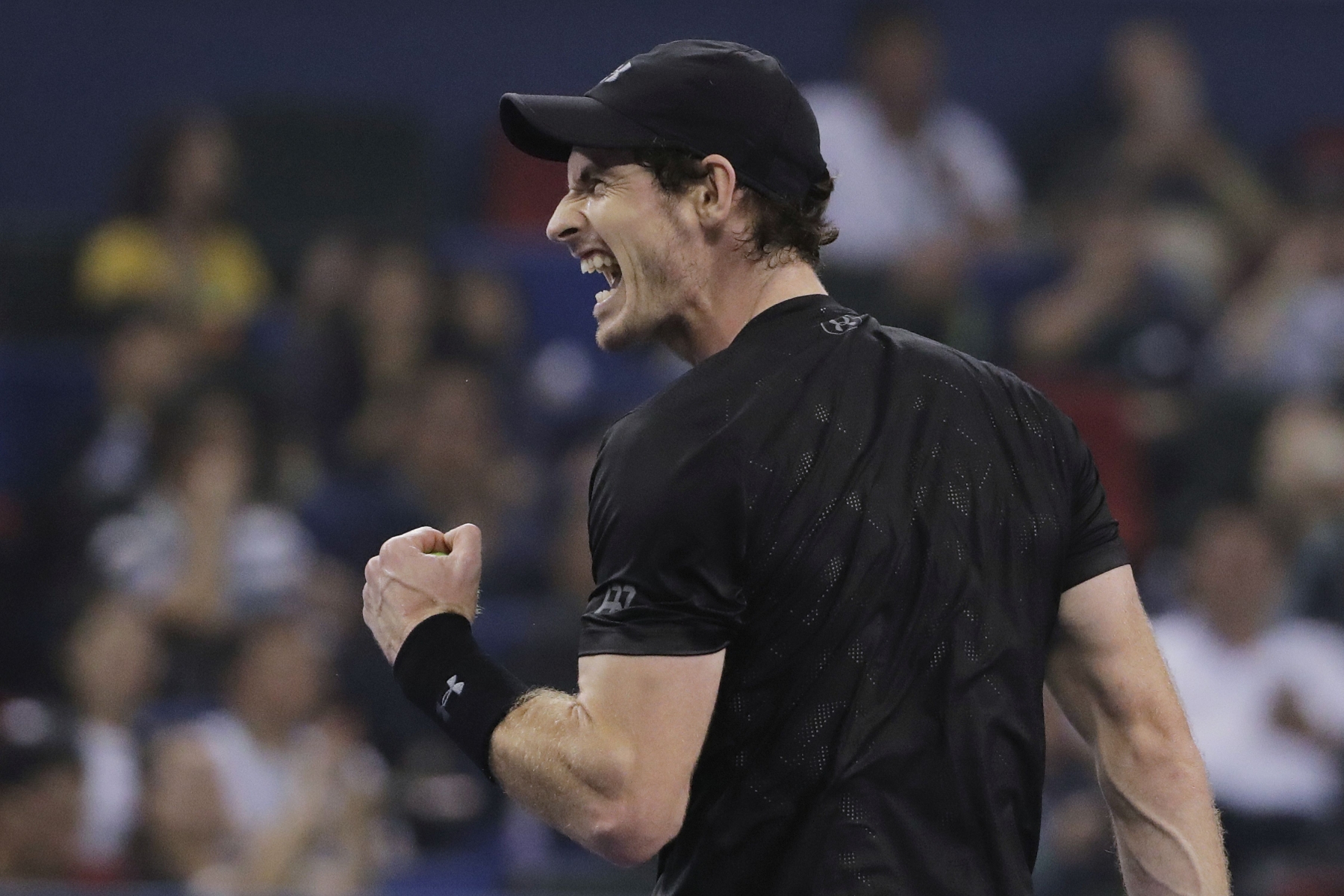 Andy Murray of Britain celebrates after defeating Roberto Bautista Agut of Spain in the men's singles final of the Shanghai Masters tennis tournament at Qizhong Forest Sports City Tennis Center in Shanghai, China, Sunday, Oct. 16, 2016. (AP Photo/Andy Wong)