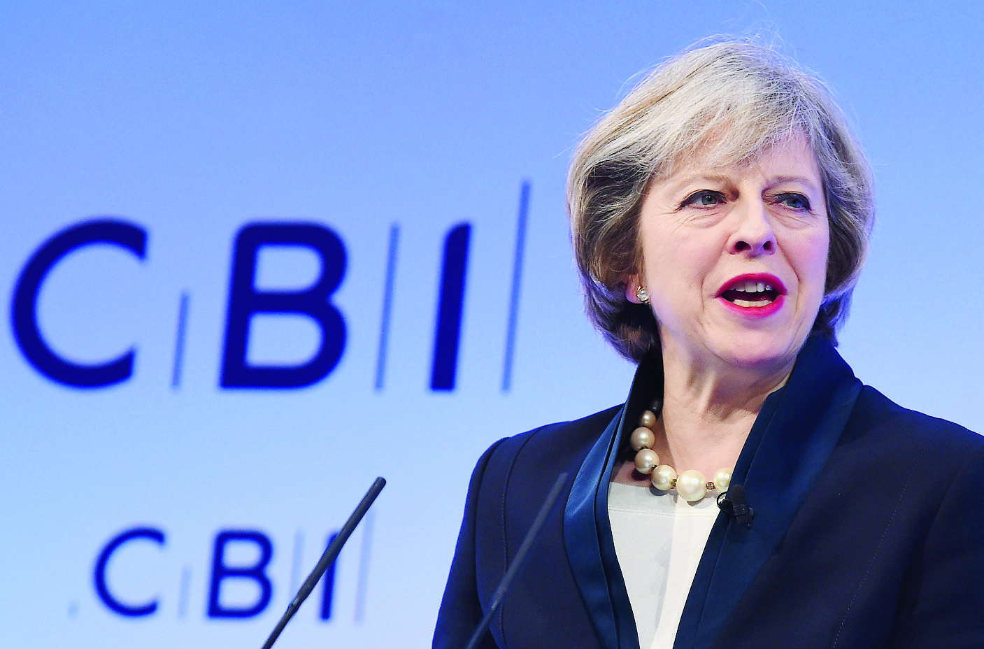 epa05640890 British Prime Minister Theresa May delivers a speech on Brexit and the British economy at the Confederation of British Industry (CBI) annual conference in central London, Britain, 21 November 2016.  EPA/ANDY RAIN BRITAIN ECONOMY CBI CONFERENCE