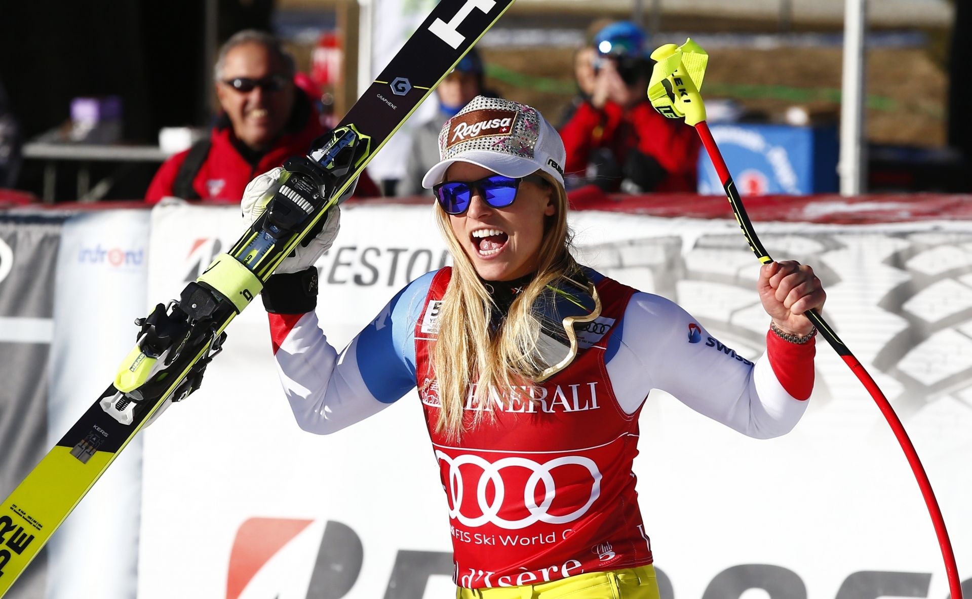 Switzerland's Lara Gut celebrates after winning an alpine ski, women's World Cup super-G, in Val d'Isere, France, Sunday, Dec. 18, 2016. (AP Photo/Giovanni Auletta)