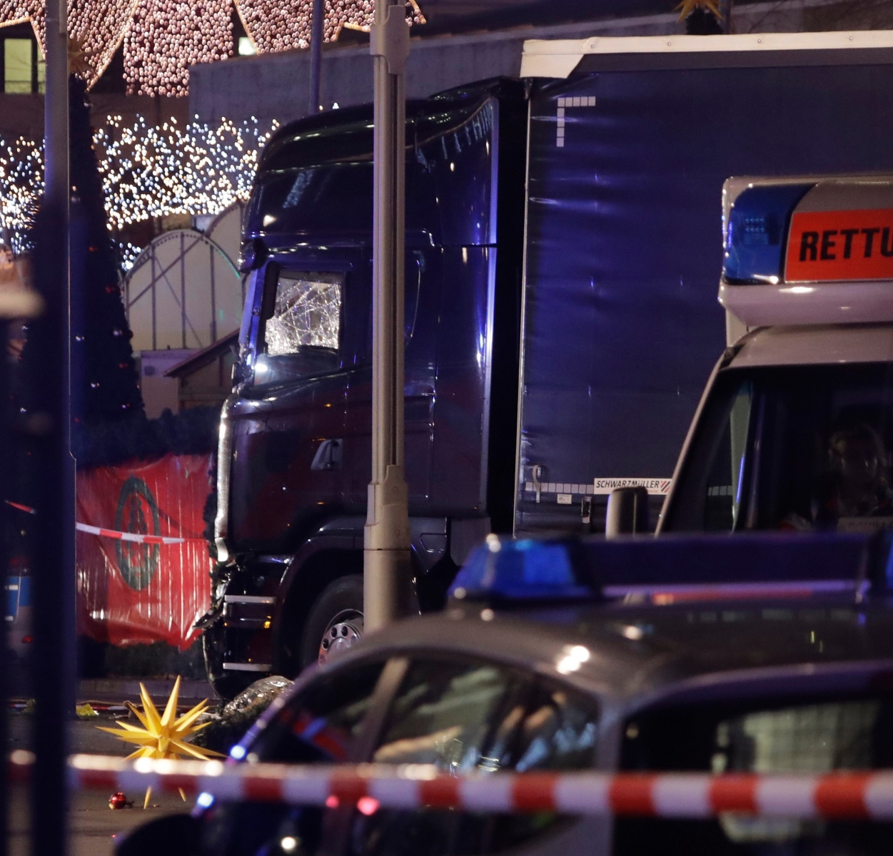 A truck which ran into a crowded Christmas market in Berlin, Germany, Monday, Dec. 19, 2016. Berlin police said that several people have been killed in the incident. (AP Photo/Michael Sohn) Germany Christmas Market