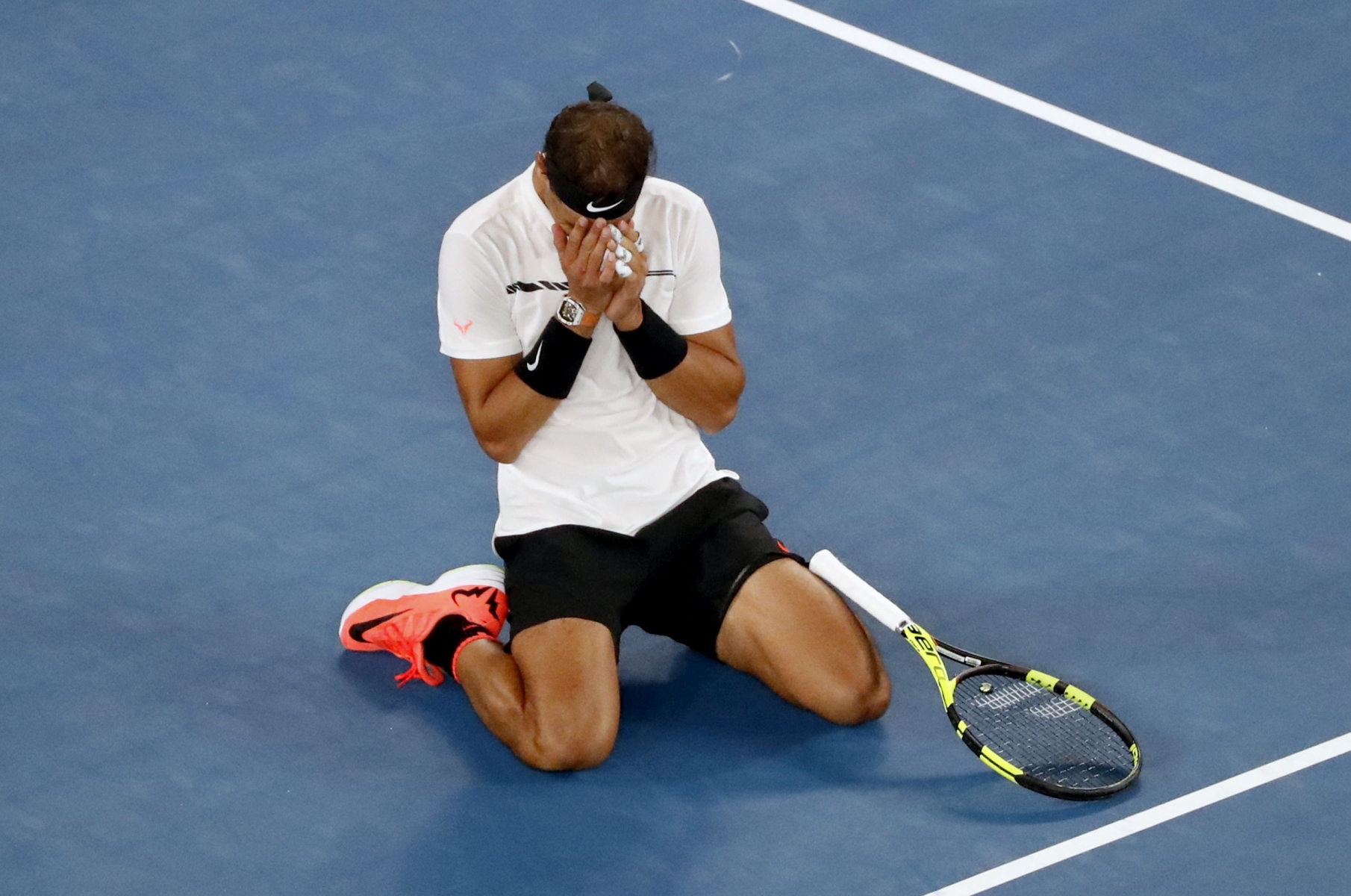 Spain's Rafael Nadal celebrates after defeating Canada's Milos Raonic during their quarterfinal at the Australian Open tennis championships in Melbourne, Australia, Wednesday, Jan. 25, 2017. (AP Photo/Dita Alangakara)