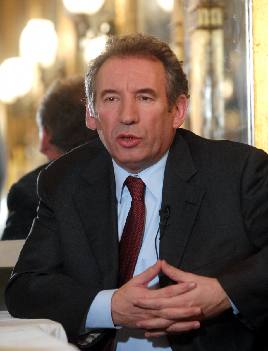 Presidential candidate and leader of the center-right Union for French Democracy party, or UDF, Francois Bayrou, answers questions from the media, in a bar,  in Aix-en-Provence, southern France, Thursday, Feb.1, 2007. (KEYSTONE/AP Photo/Claude Paris) FRANCE BAYROU