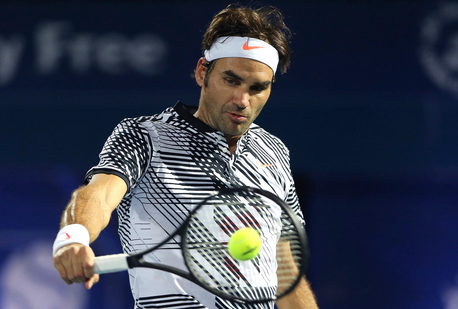 Roger Federer of Switzerland returns the ball to Benoit Paire of France during the Dubai Tennis Championships in Dubai, United Arab Emirates, Monday, Feb. 27, 2017. (AP Photo/Kamran Jebreili) DUBAI TENNIS