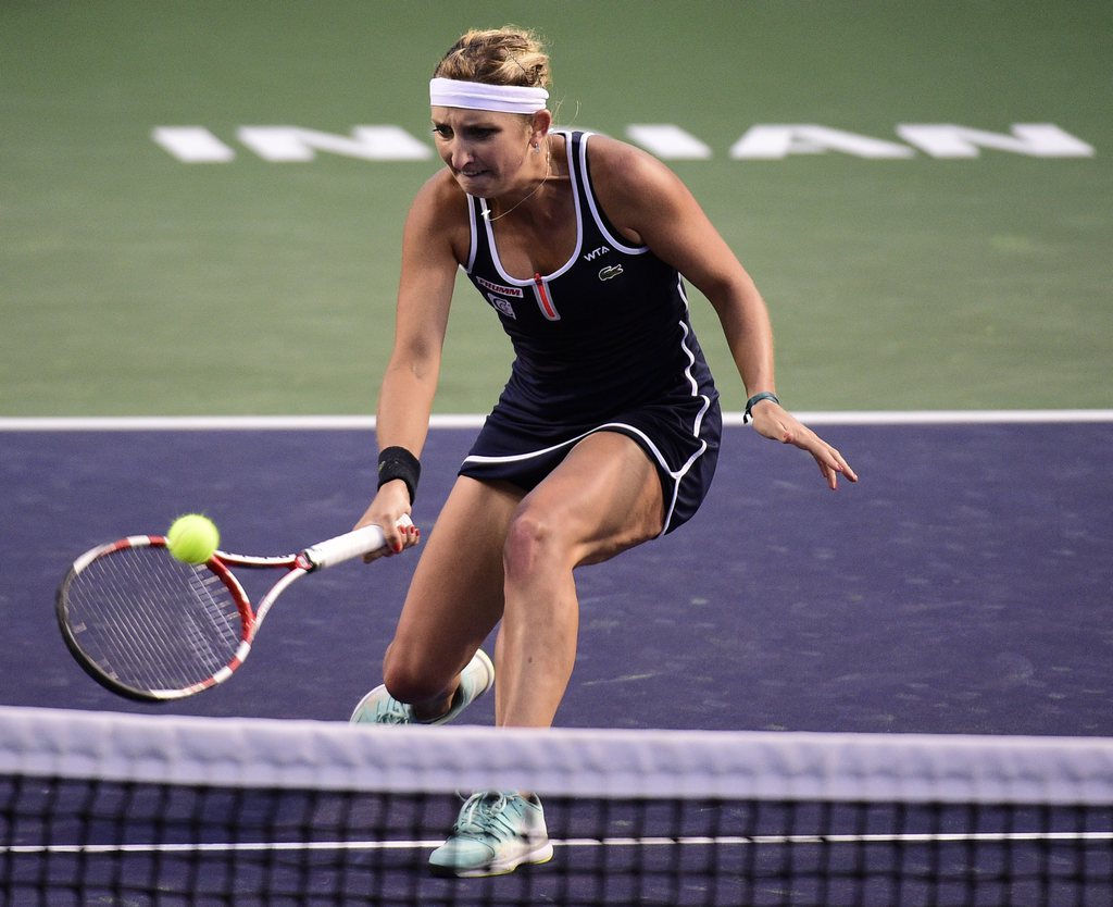 Timea Bacsinszky a conclu sur sa sixième balle de match... après en avoir sauvé quatre. (Archives)