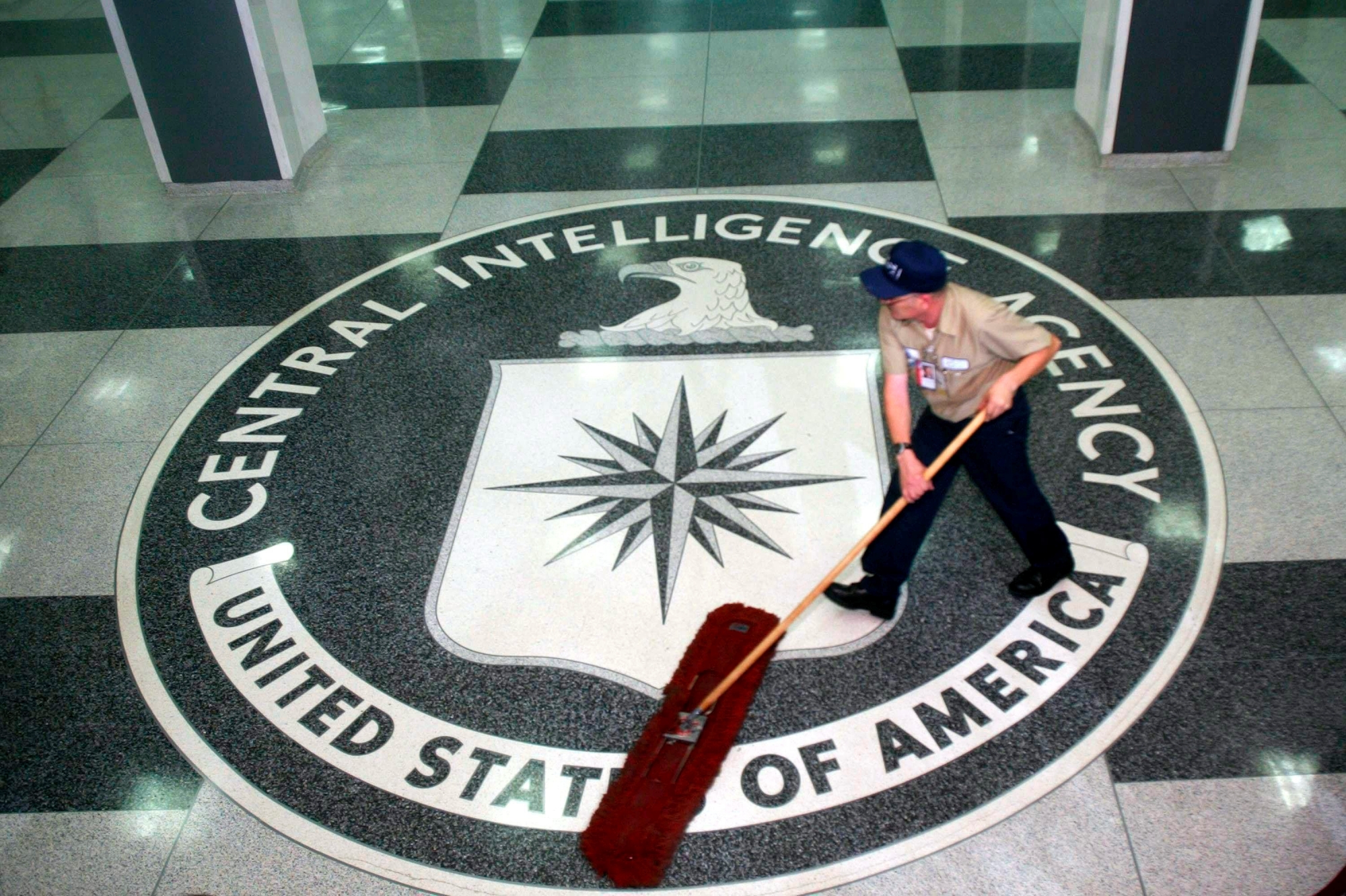 epa05834710 (FILE) - A worker at the CIA sweeping the foyer clean at the CIA Headquarters, Langley, Virginia, USA, 03 March 2005 (reissued 07 March 2017). According to whistleblower website WikiLeaks on 07 March 2017, the organization has published documents codenamed 'Vault 7', allegedly originating from CIA's Center for Cyber Intelligence. Based on the documents, Wikileaks claims that the CIA hackers were able to hack into iPhones, Android phones and smart TV sets.  EPA/DENNIS BRACK / POOL (FILE) USA ESPIONAGE HACKING CIA WIKILEAKS