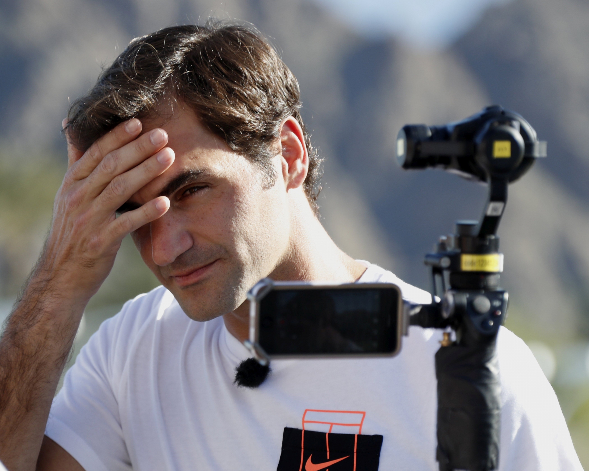 epa05837660 Roger Federer of Switzerland wipes his forehead on media day during the 2017 BNP Parnibas Open tennis tournament at the Indian Wells Tennis Garden in Indian Wells, California, USA, 08 March 2017.  EPA/PAUL BUCK