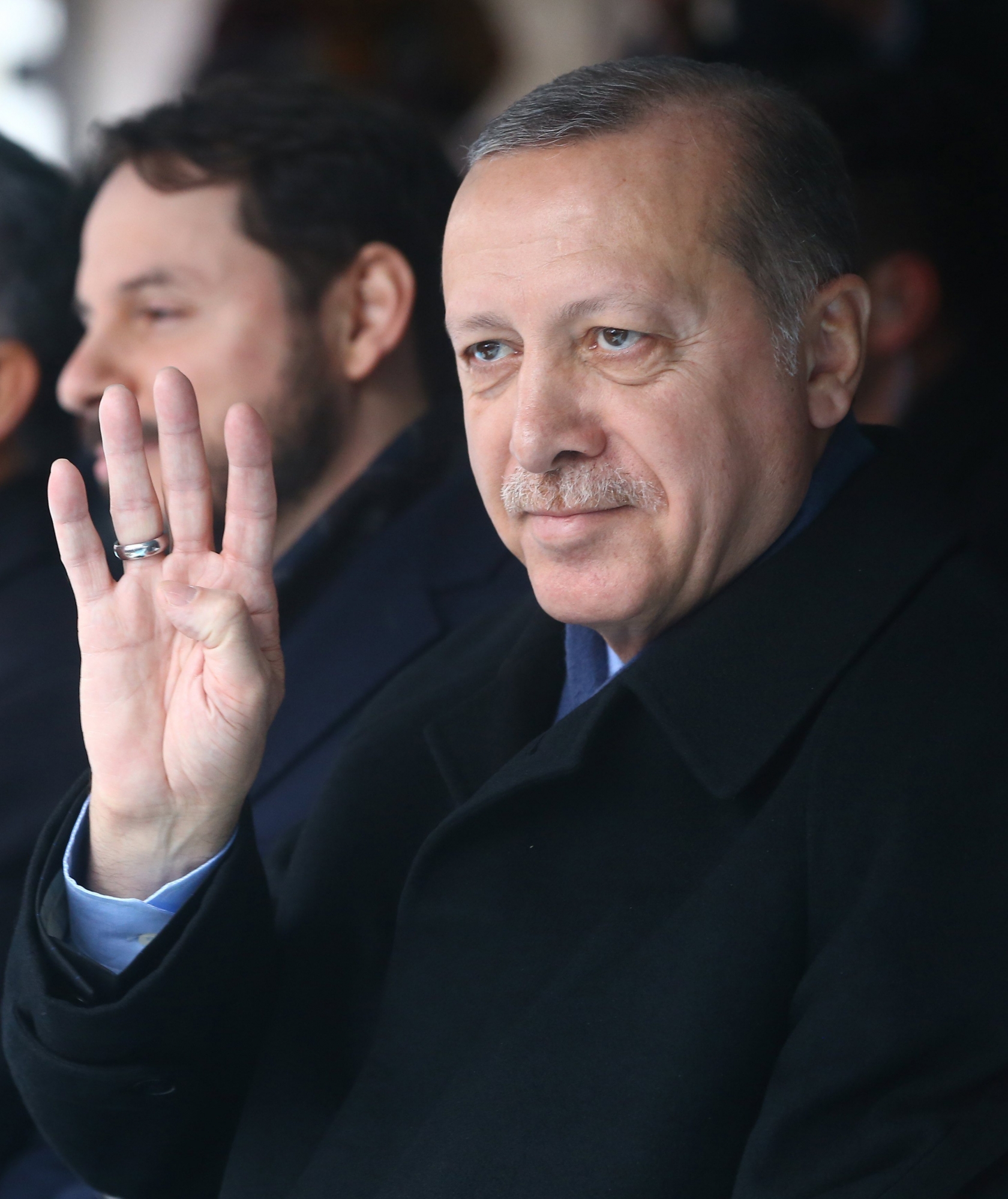 epa05842476 A handout picture provided by The Turkish President Press office shows, Turkish President Recep Tayyip Erdogan (L) waving to his supporters during the opening ceremony of facilities in Istanbul, Turkey, 11 March 2017. Turkish parliament on 21 January approved a reform of the constitution to change the country's parliamentarian system of governance into a presidential one, which the opposition denounced as giving more power to Turkish president Recep Tayyip Erdogan. A referendum on the amendments is expected to be held in April.  EPA/TURKISH PRESIDENT PRESS OFFICE HANDOUT  HANDOUT EDITORIAL USE ONLY/NO SALES TURKEY CONSTITUTION REFERENDUM