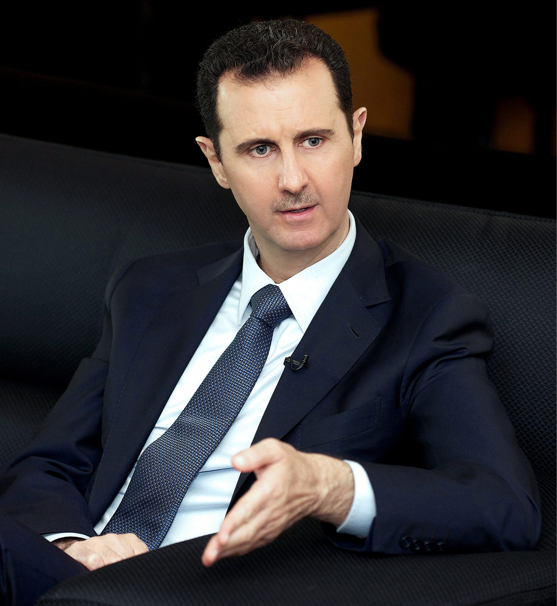 epa03900410 A handout picture made available 07 October 2013 by the Syrian Arab News Agency (SANA) shows Syrian President Bashar al-Assad speaking during an interview with the German Der Spiegel News Magazine in Damascus, Syria, 02 October 2013. Al-Assad, who is facing an unprecedented uprising against his rule, admitted in an interview with the Germany magazine Der Spiegel that he and his regime have made mistakes but added his government "has no other option than to believe in our victory." He also was quoted as saying that the West would sooner believe the al-Qaeda terrorist network than him.  EPA/SANA HANDOUT  HANDOUT EDITORIAL USE ONLY/NO SALES SYRIEN KONFLIKT ASSAD INTERVIEW