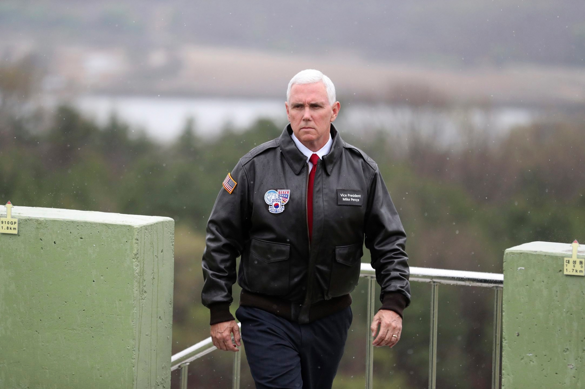 U.S. Vice President Mike Pence arrives at Observation Post Ouellette in the Demilitarized Zone (DMZ), near the border village of Panmunjom, which has separated the two Koreas since the Korean War, South Korea, Monday, April 17, 2017.  Pence says the "era of strategic patience is over" with North Korea, expressing impatience with the willingness of the North Korean regime to move toward ridding itself of nuclear weapons and ballistic missiles. His 10-day tour of Asia comes as tensions grow in the wake of North Korea's latest missile test. (AP Photo/Lee Jin-man) South Korea US Pence Korea