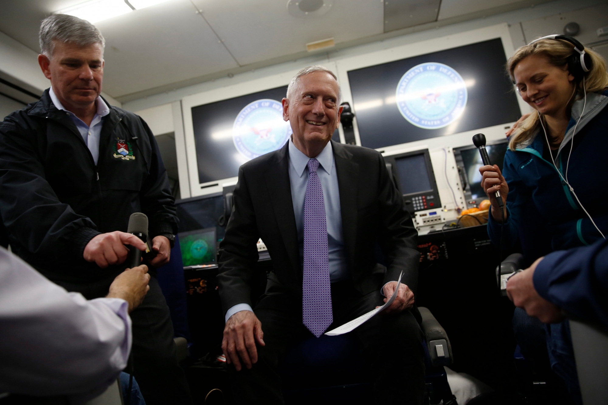 U.S. Defense Secretary James Mattis jokes with reporters as he sits down to brief them in their cabin aboard his plane en route to the Middle East after departing from Joint Base Andrews, Maryland, Monday, April 17, 2017. (Jonathan Ernst/Pool photo via AP) Saudi Arabia US Mattis