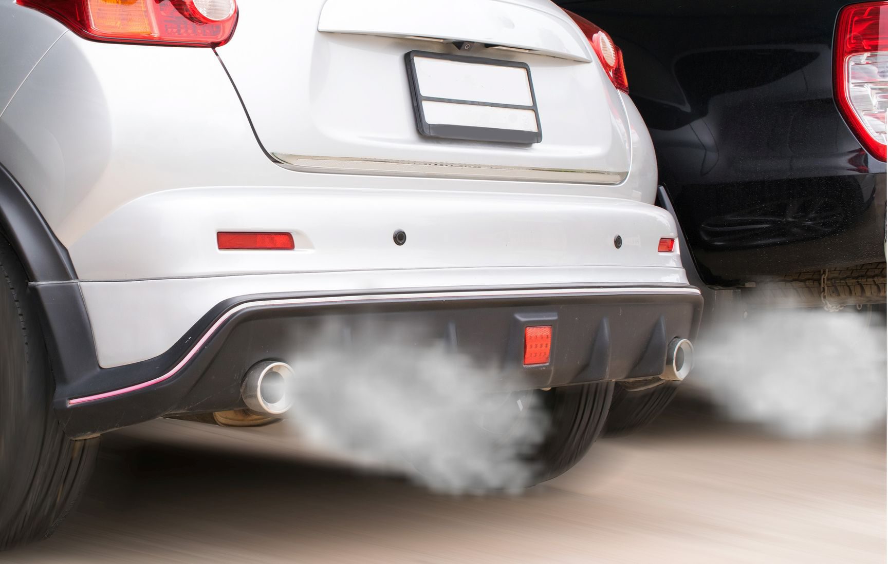 combustion fumes coming out of car exhaust pipe combustion fumes coming out of car exhaust pipe