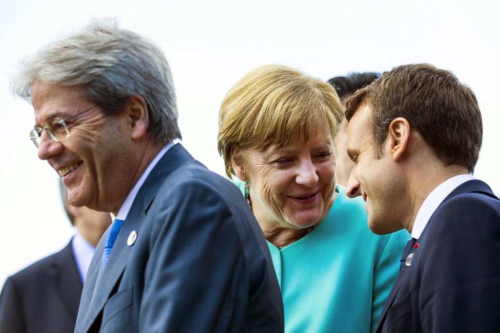 Paolo Gentiloni, Angela Merkel et Emmanuel Macron regrettent tous trois la décision du président américain. (Illustration)