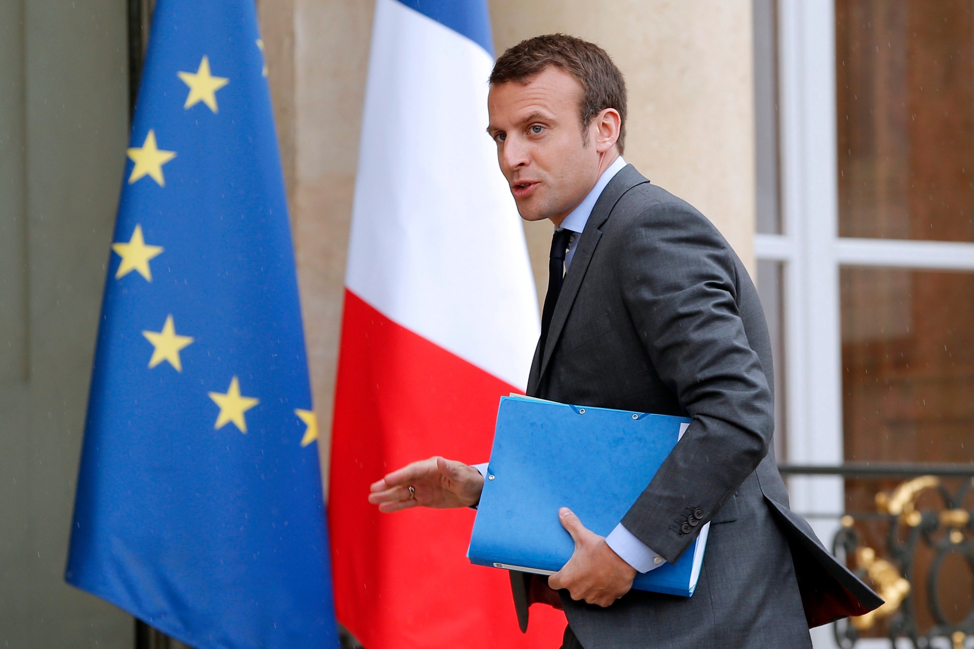 epa05297807 French Economy Minister Emmanuel Macron arrives at the Elysee Palace to attend an extraordinary Cabinet Meeting in Paris, France, 10 May 2016. The French Council of Ministers has authorized the French Prime Minister Manuel Valls to use the 49.3 article of the French constitution to pass the controversial labor reform law at Parliament. Article 49.3 of the French constitution authorizes the government to pass a bill without putting it for a vote at the French Parliament afterwards and it engages the responsibility of the government if ever the 49.3 is censored and forced to be voted and denied.  EPA/YOAN VALAT FRANCE LABOR