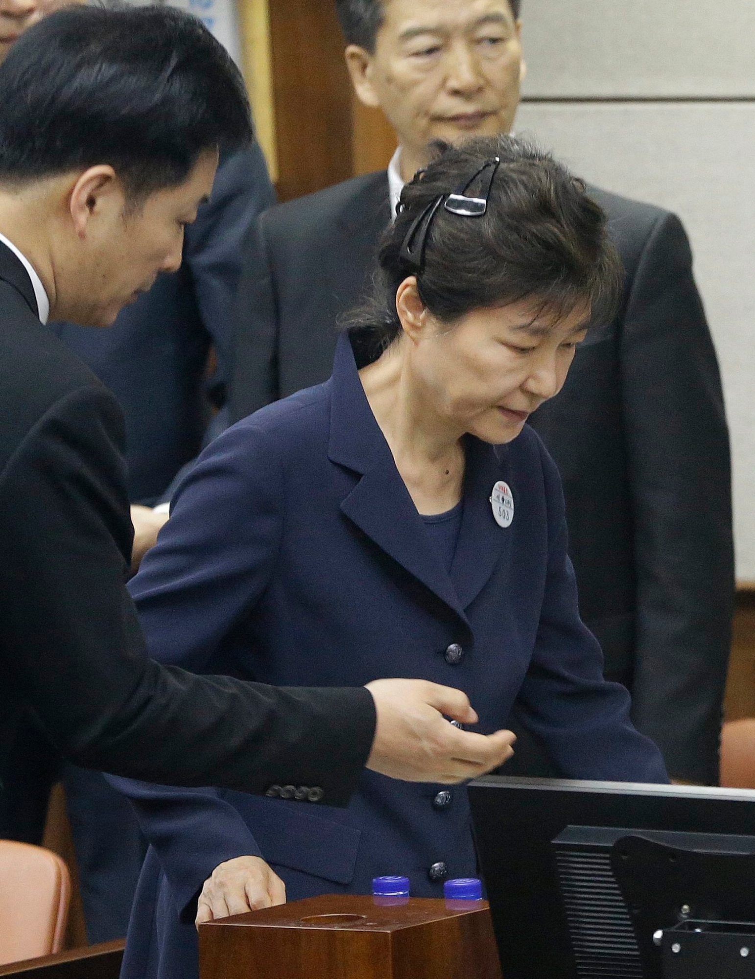 Former South Korean President Park Geun-hye, center, arrives for her trial at the Seoul Central District Court in Seoul, South Korea, Tuesday, May 23, 2017. (AP Photo/Ahn Young-joon, Pool) South Korea Park's Trial