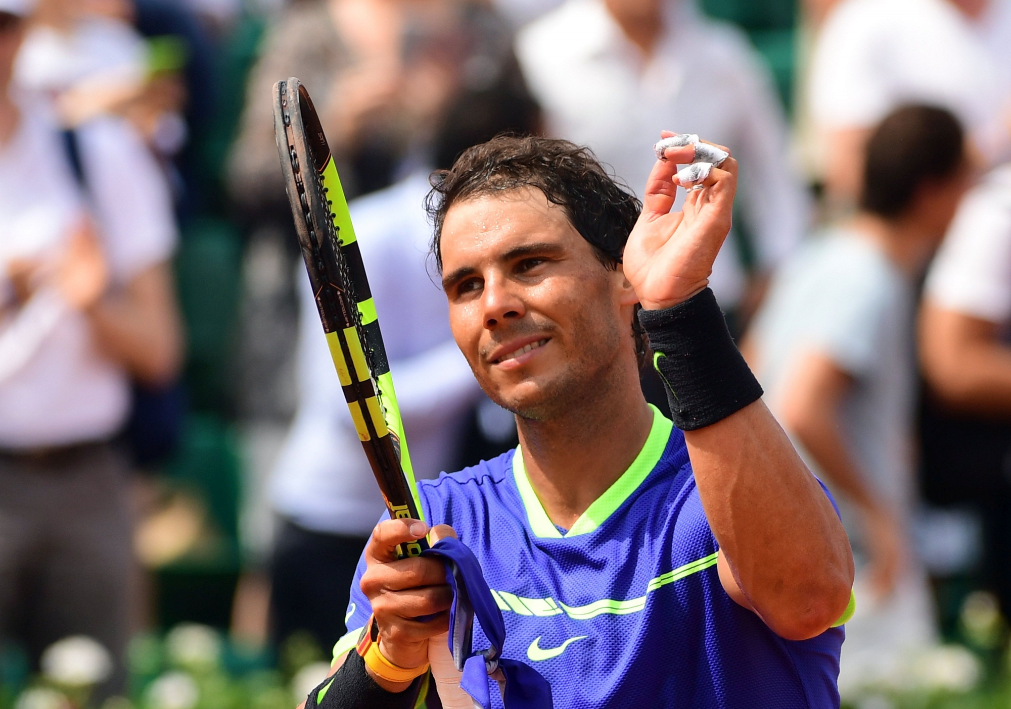 epa05997606 Rafael Nadal of Spain reacts after winning against Benoit Paire of France during their menís 1st round single match  during the French Open tennis tournament at Roland Garros in Paris, France, 29 May 2017.  EPA/CAROLINE BLUMBERG