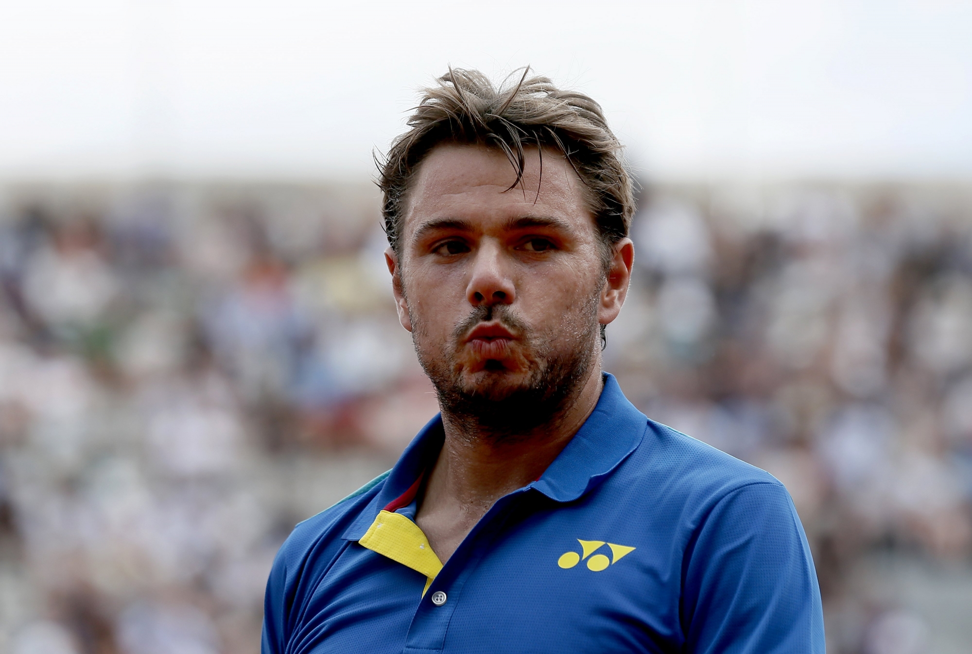 epa05999149 Stan Wawrinka of Switzerland reacts as he plays against Jozef Kovalik of Slovakia during their menís 1st round single match during the French Open tennis tournament at Roland Garros in Paris, France, 30 May 2017.  EPA/ETIENNE LAURENT