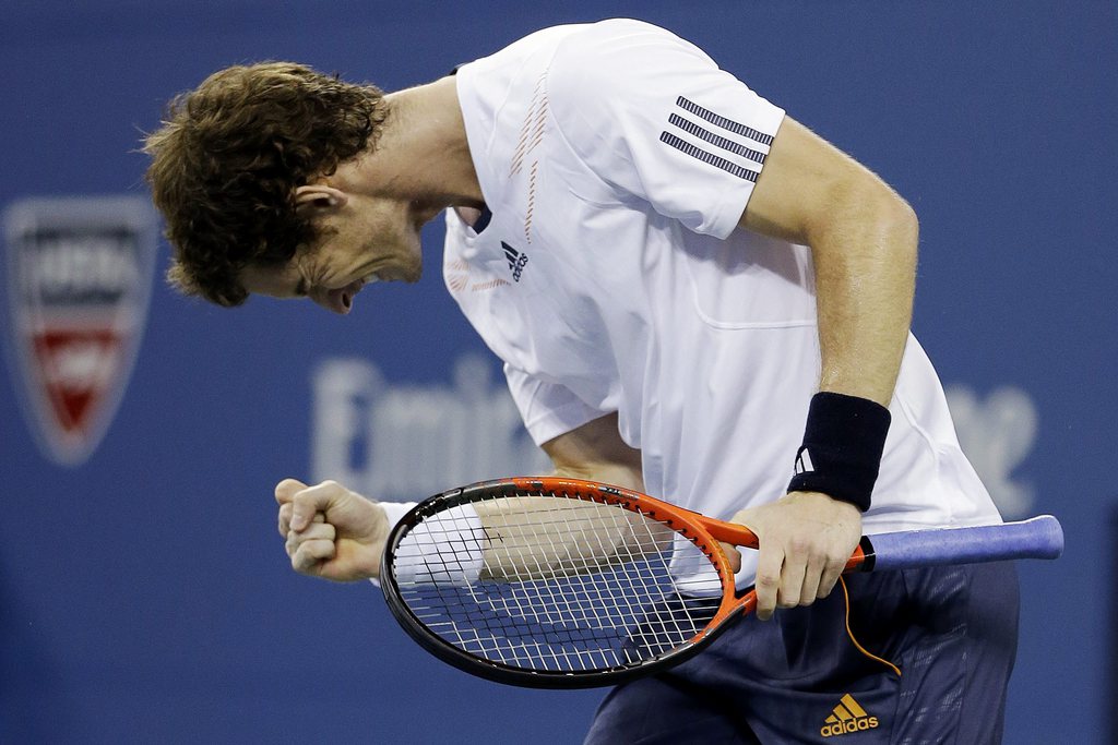 Andy Murray, of Britain, reacts after breaking the serve of Milos Raonic, of Canada, during a match at the U.S. Open tennis tournament, Monday, Sept. 3, 2012, in New York. (AP Photo/Darron Cummings)