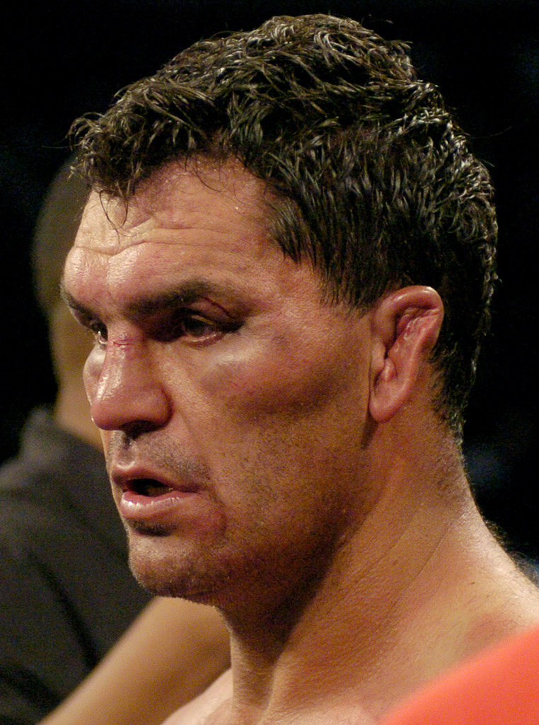 Corrie Sanders walks away with an injured ear after losing his 12-round WBC heavyweight championship bout against Vitali Klitschko in Los Angeles, Saturday, April 24, 2004. Klitschko won the fight by TKO in the eighth round. (AP Photo/Mark J. Terrill)