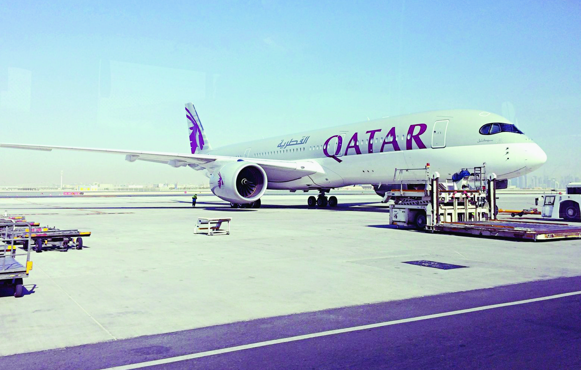 A parked Qatari plane in Hamad International Airport (HIA) in Doha, Qatar, Tuesday, June 6, 2017. Qatar's foreign minister says Kuwait is trying to mediate a diplomatic crisis in which Arab countries have cut diplomatic ties and moved to isolate his energy-rich, travel-hub nation from the outside world. (AP Photo/Hadi Mizban) Qatar