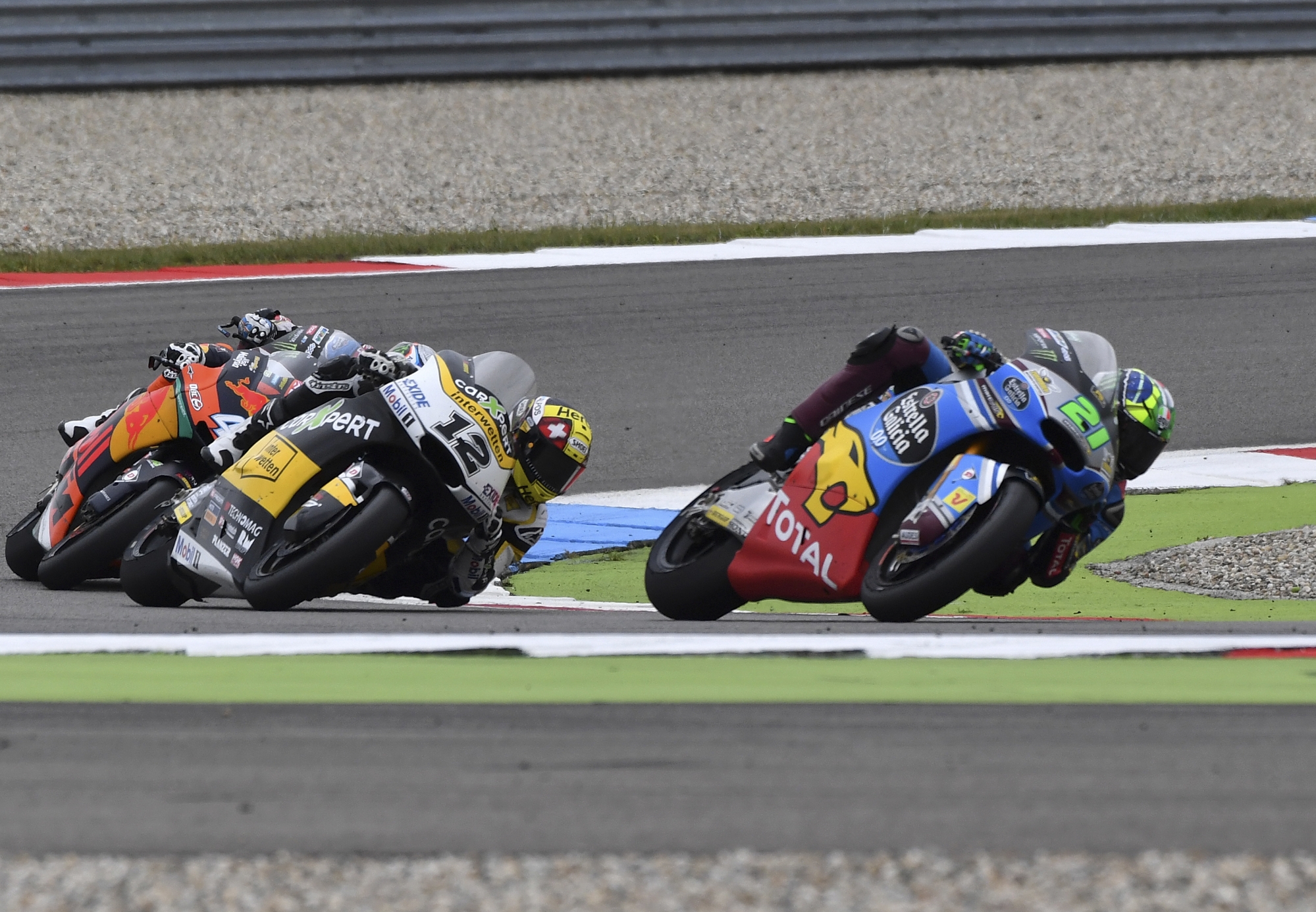 Moto 2 rider Franco Morbidelli of Italy, right, takes a curve followed by Thomas Luethi of Switzerland during the Dutch Motorcycle Grand Prix, in Assen, Northern Netherlands, Sunday, June 25, 2017. (AP Photo/Geert Vanden Wijngaert)