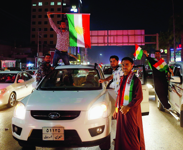epa06227011 Kurds celebrate to show their support for the independence referendum in in Erbil, Kurdistan region in northern Iraq, 25 September 2017. The Kurdistan region is an autonomous region in northern Iraq since 1991, with an estimated population of 5.3 million people. The region share borders with Turkey, Iran, and Syria, all of which have large Kurdish minorities. On 25 September the Kurdistan region holds a referendum for independence and the creation of the state of Kurdistan amidst divided international support.  EPA/MOHAMED MESSARA IRAQ KURDISTAN REFERENDUM