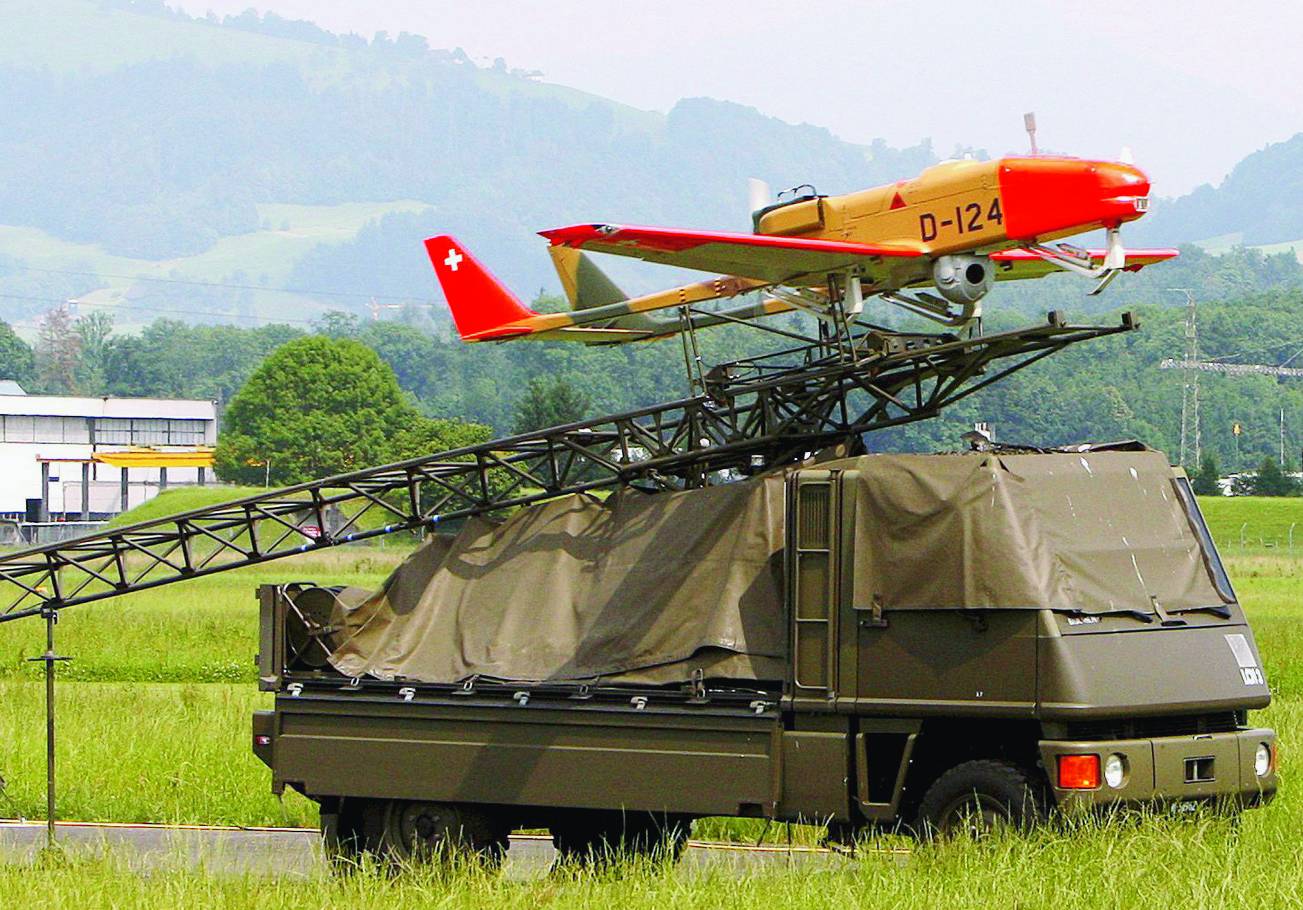 epa01378418 An unmanned D 124 drone of the Swiss army starts for an inspection flight at the airfield in Emmen near Lucerne, Switzerland, 12 June 2008. Drones are used to control the airspace around the Swiss Euro 2008 soccer stadiums.  EPA/SIGI TISCHLER SWITZERLAND SOCCER EURO 2008 ARMY