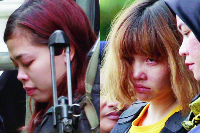 FILE - In this combination of March 1, 2017, file photos, Indonesian suspect Siti Aisyah, left, and Vietnamese suspect Doan Thi Huong, both suspects in the killing of Kim Jong Nam, North Korean leader Kim Jong Un's estranged half brother, are escorted out of court by police officers in Sepang, Malaysia. The trial of two women accused of poisoning the estranged half brother of North Korea's ruler is scheduled to begin Monday, Oct. 2, 2017,  in Malaysia's High Court, nearly eight months after the brazen airport assassination.(AP Photo/Daniel Chan, File) Malaysia North Korea